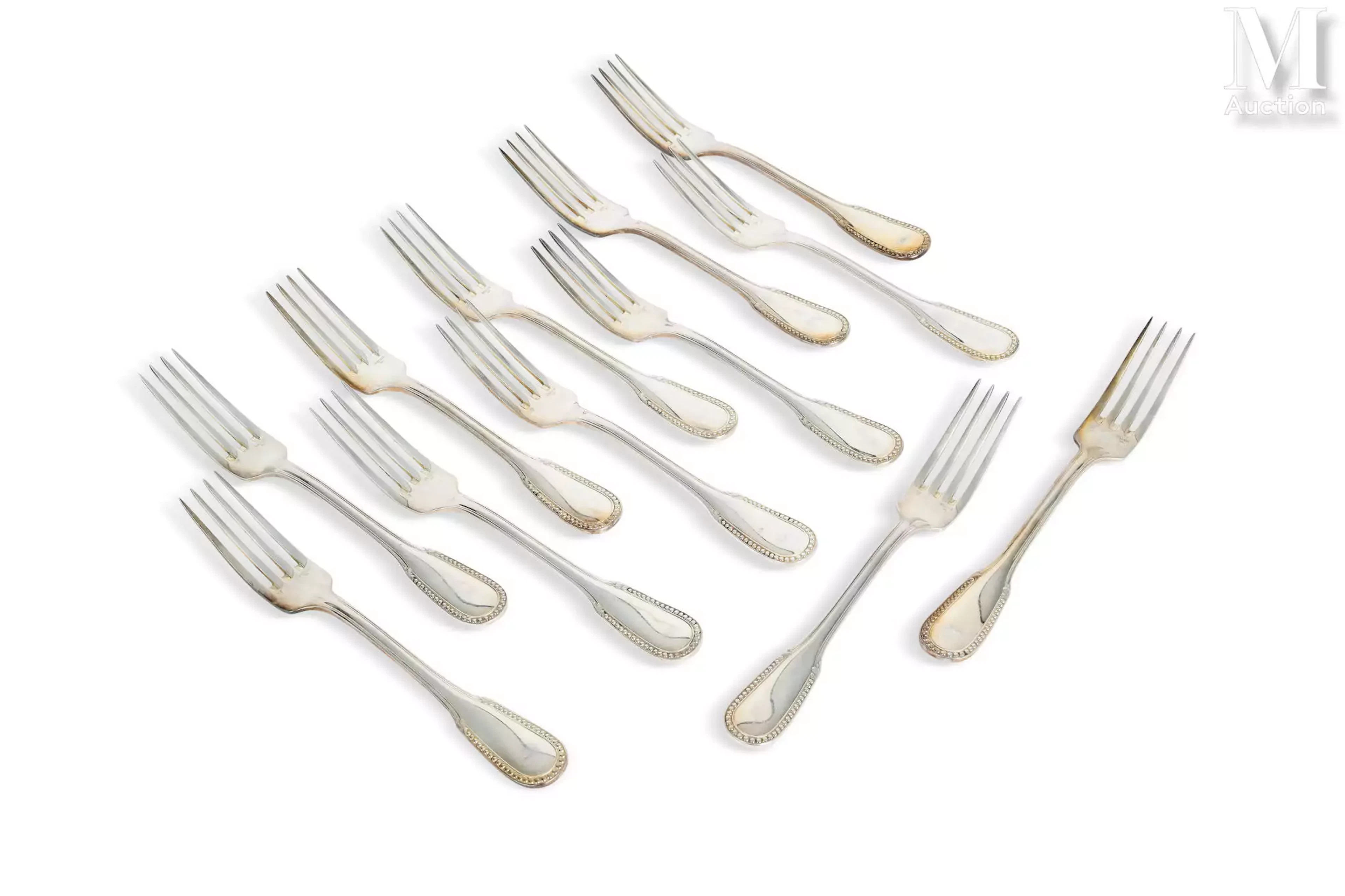 Lot de couverts en argent composé de :