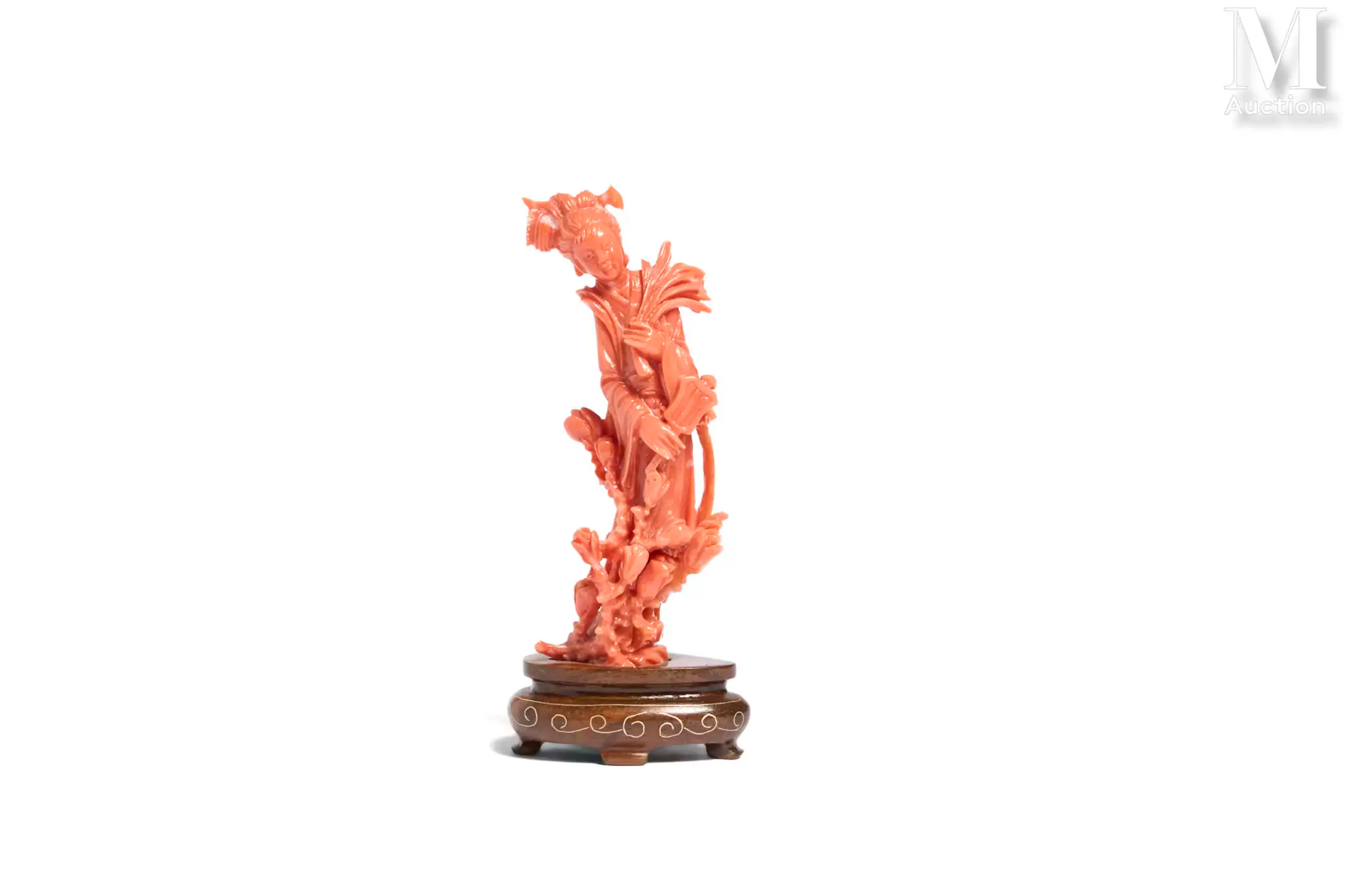 CHINE, XXe siècle Branche de corail orange* sculptée