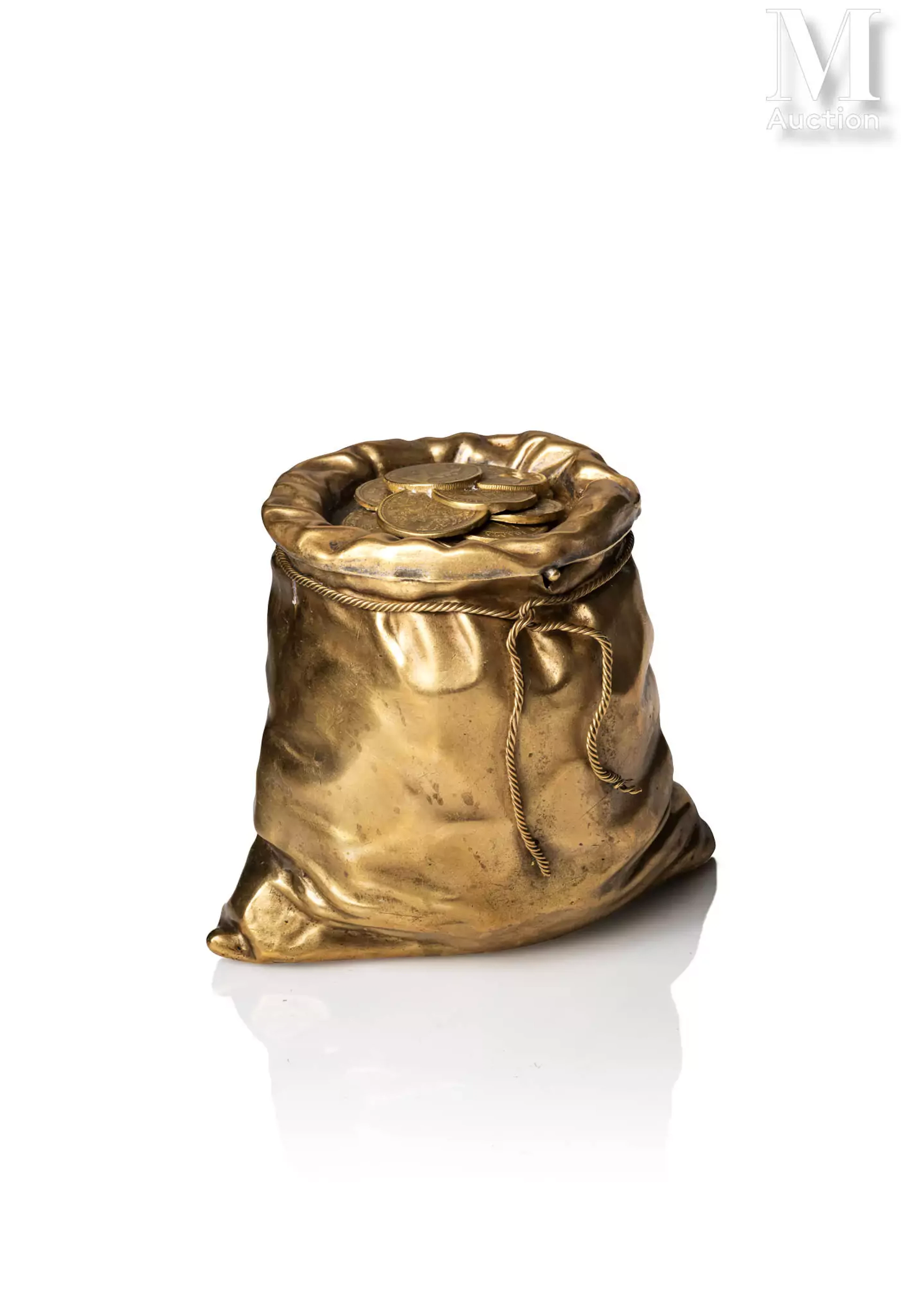 Tirelire en métal doré à décor en trompe l'œil