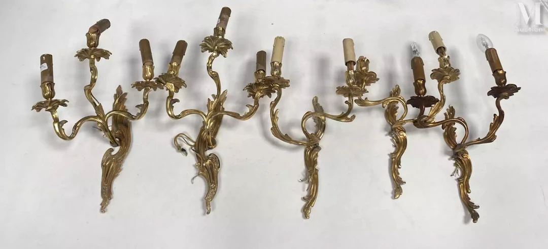 Paire d'appliques à trois lumières