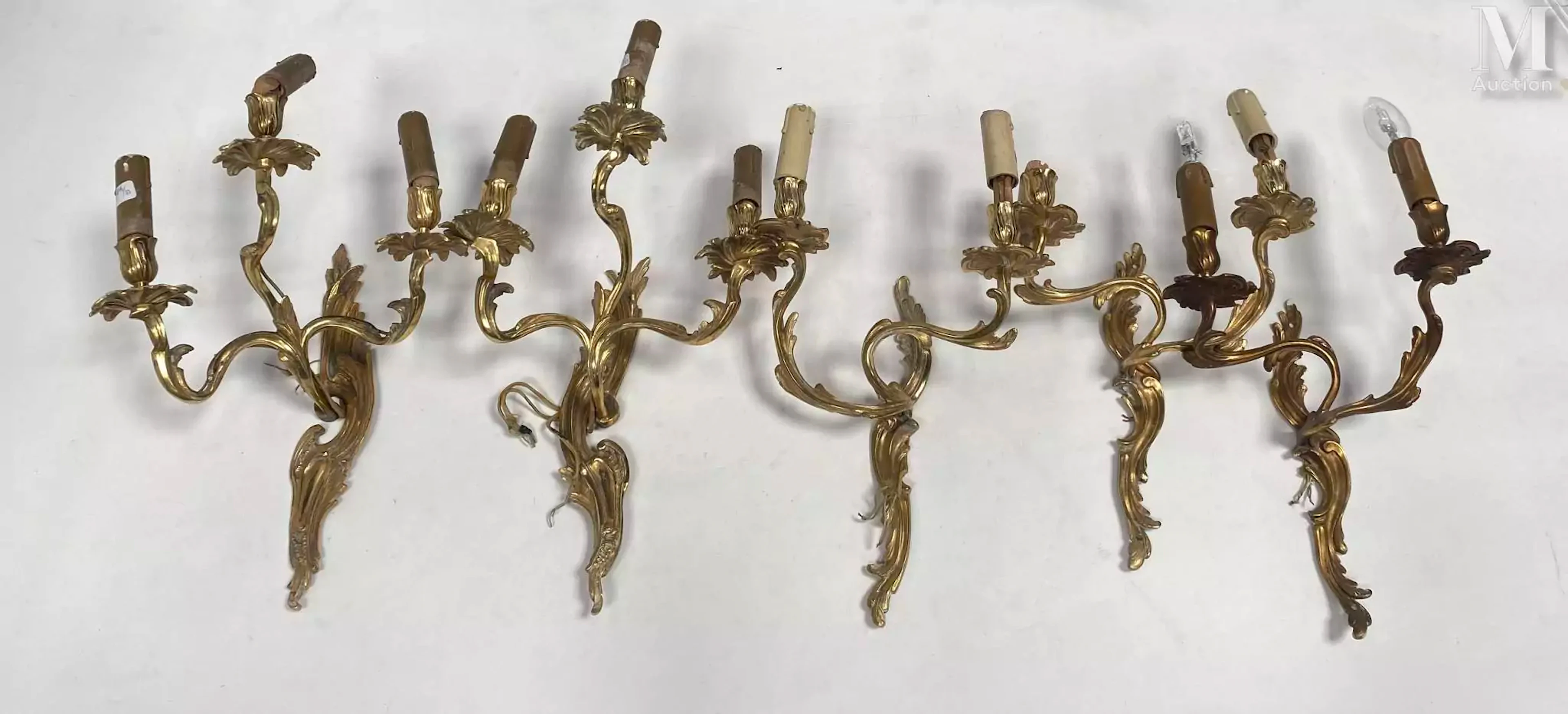 Paire d'appliques à trois lumières