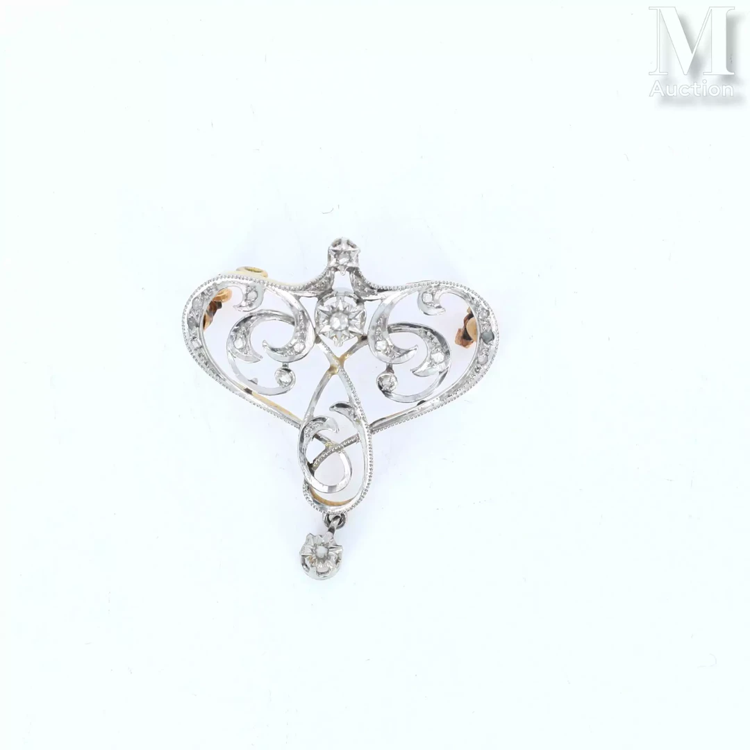 Broche pendentif volute