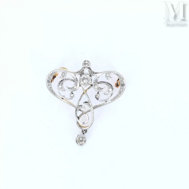 Broche pendentif volute