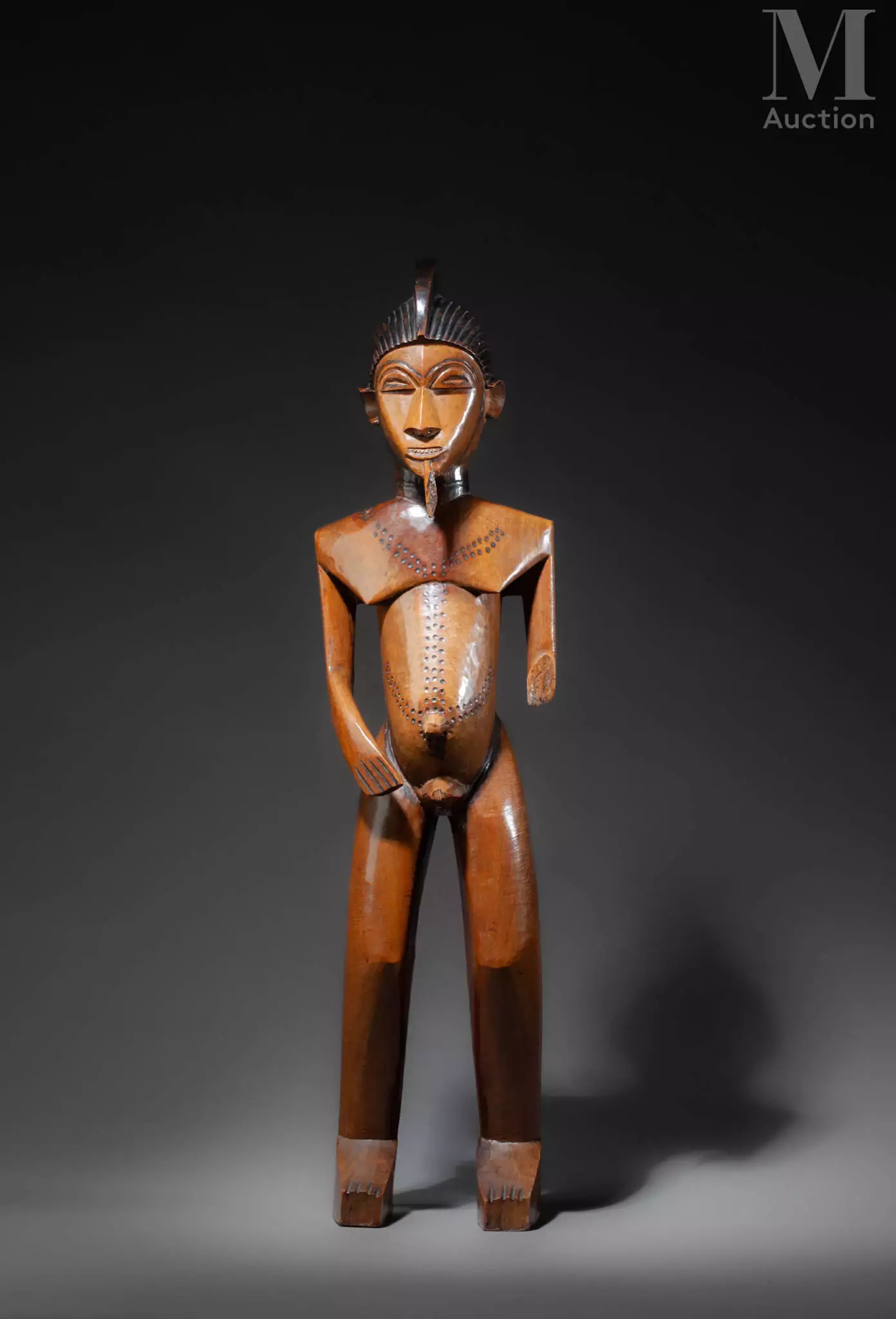 Statue masculine Lobi attribuée à Sikire Kambire.