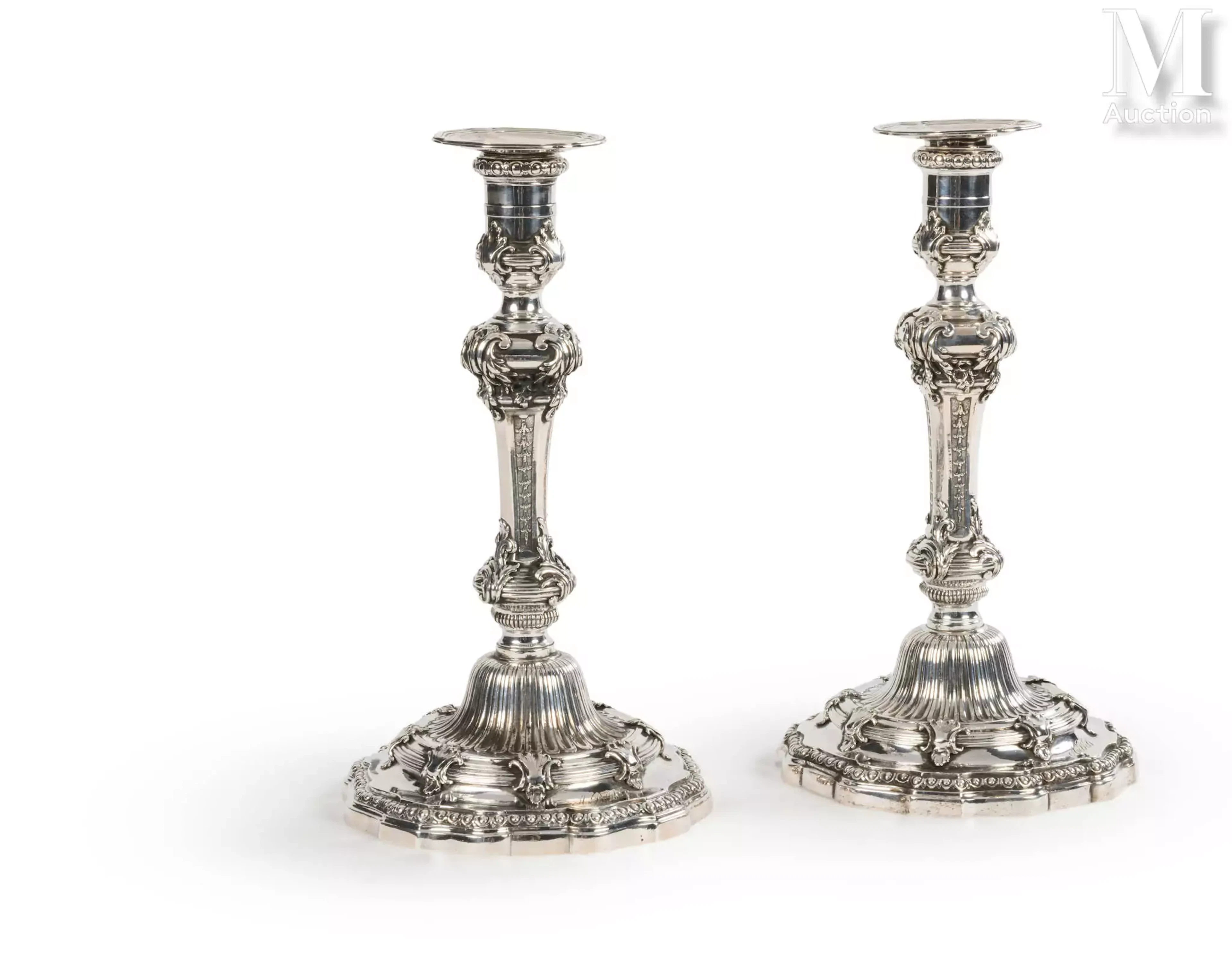 Paire de flambeaux en argent;