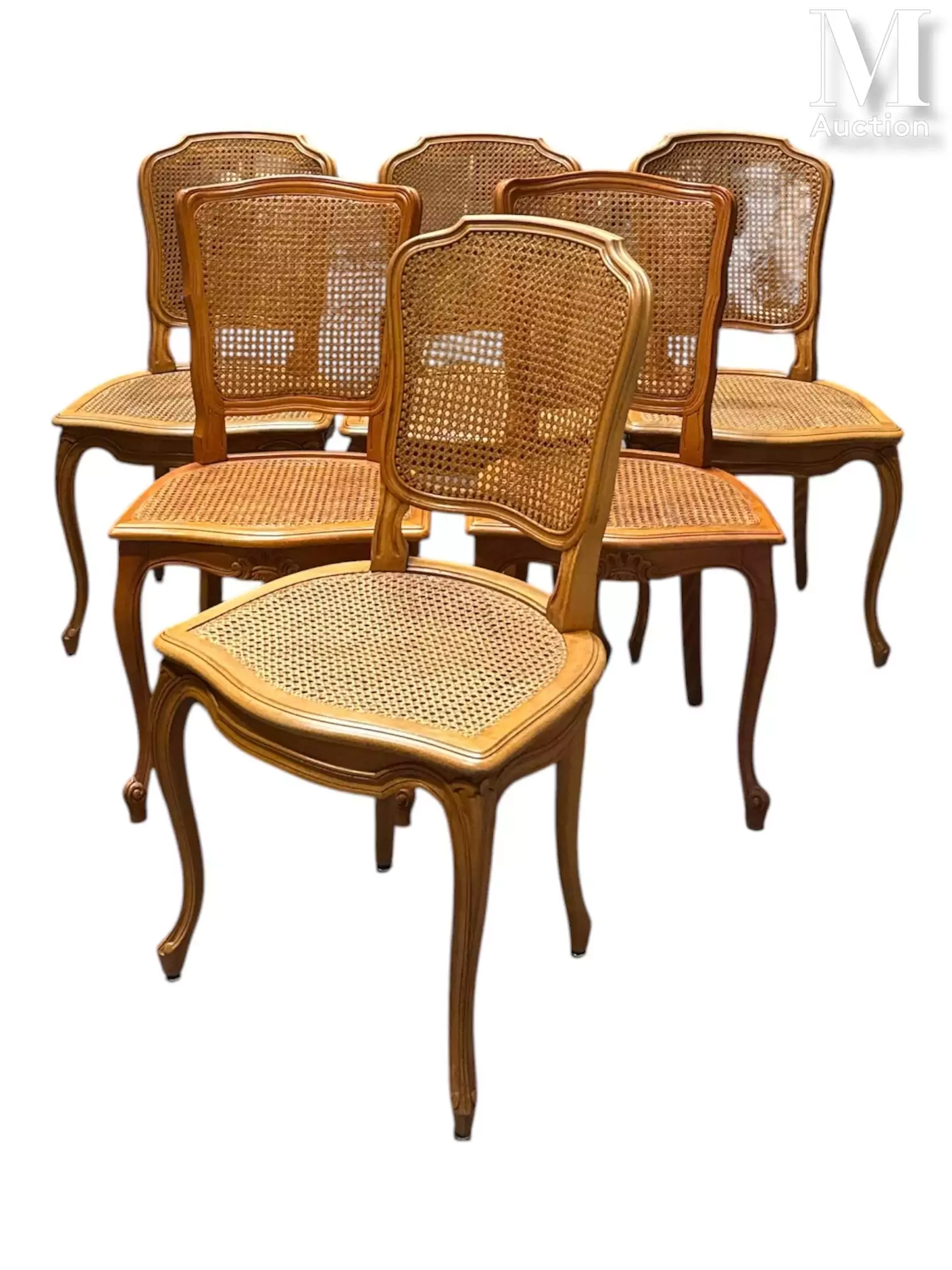 SUITE DE QUATRE CHAISES CANNÉES