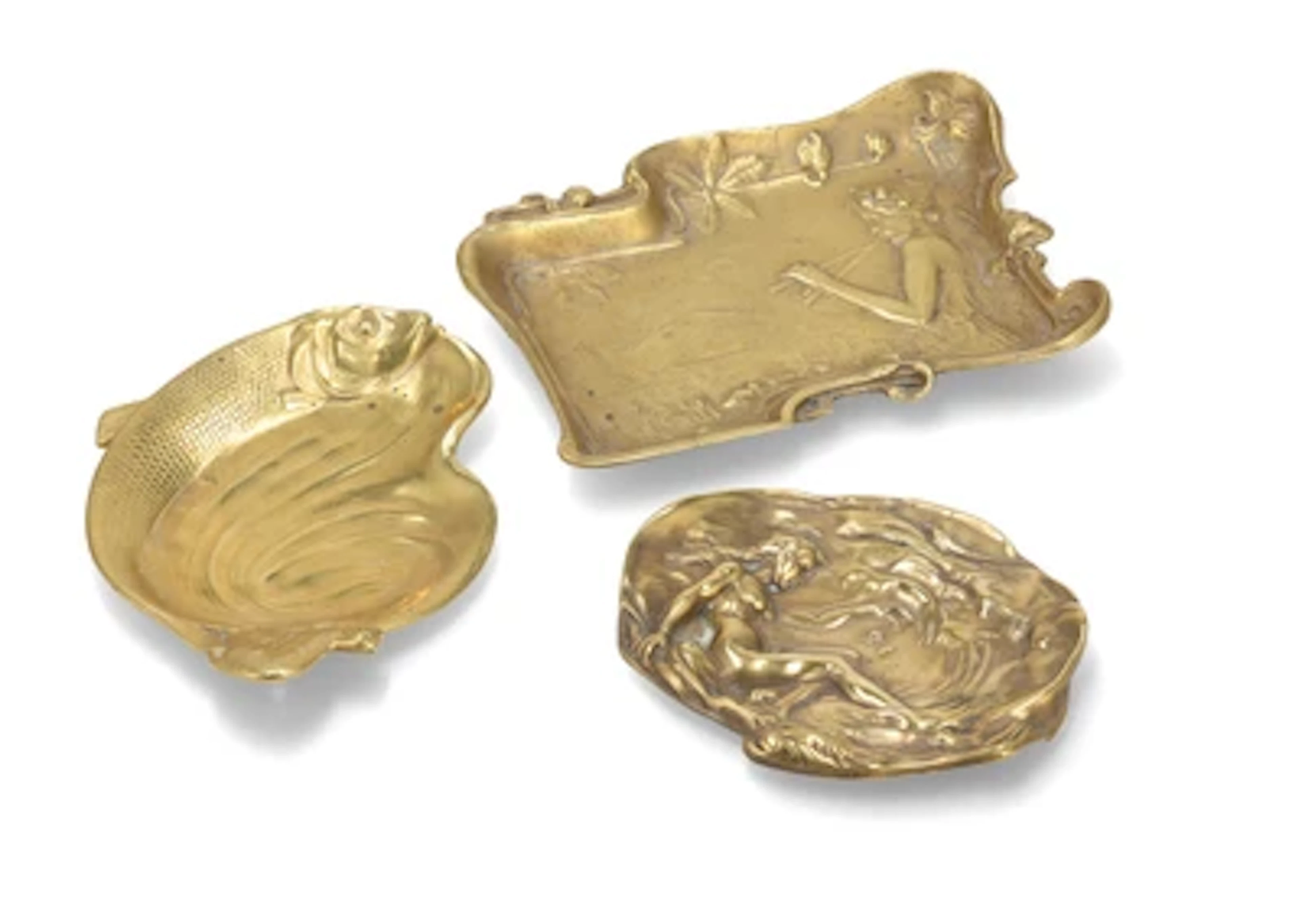 Two bronze bowls with female motifs and a bronze bowl with a cat and a fish