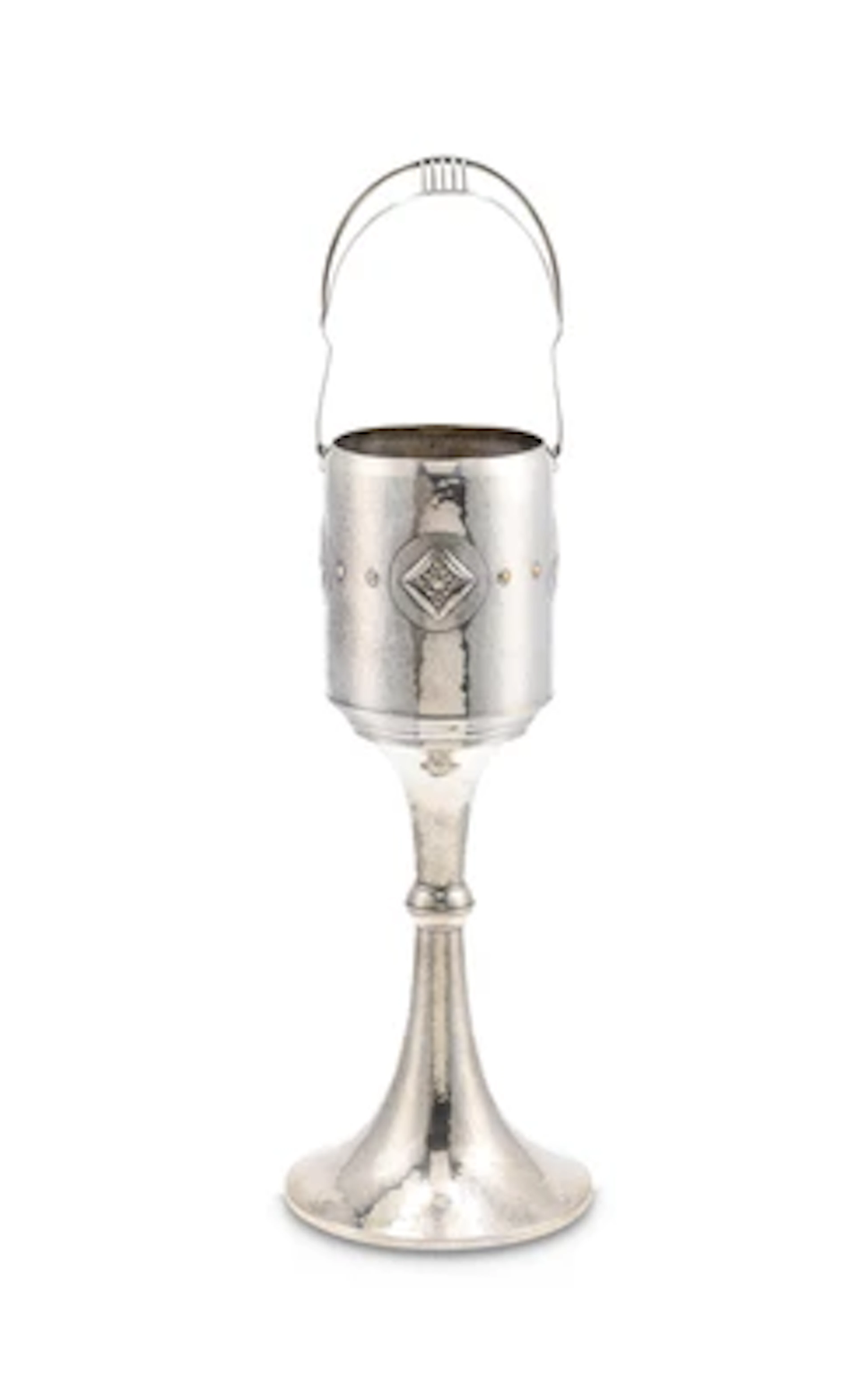 A tall silver-plated bottle cooler with ornamental and hammered decoration