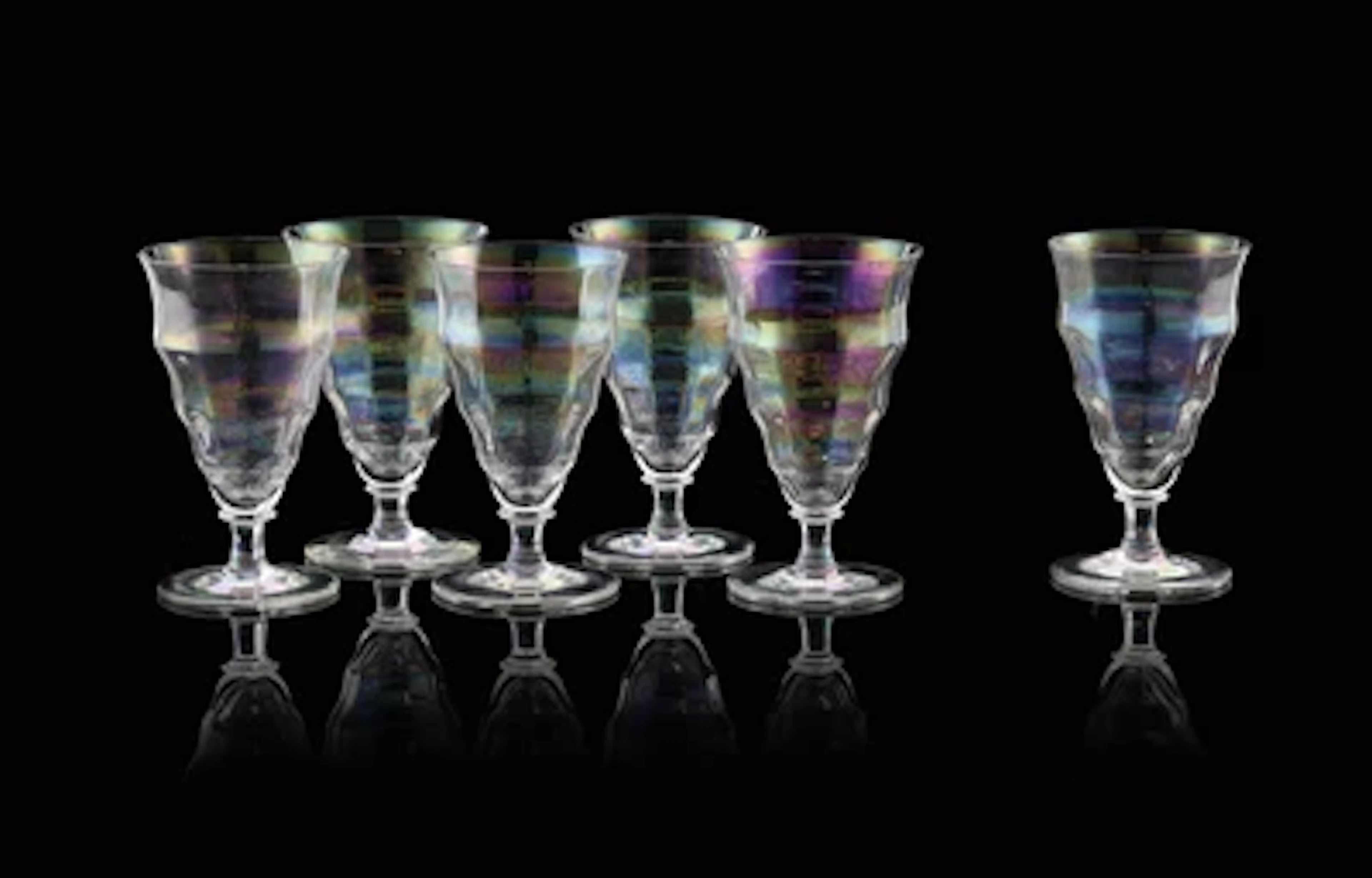 Six glasses in a silver-plated stand and six dessert wine glasses