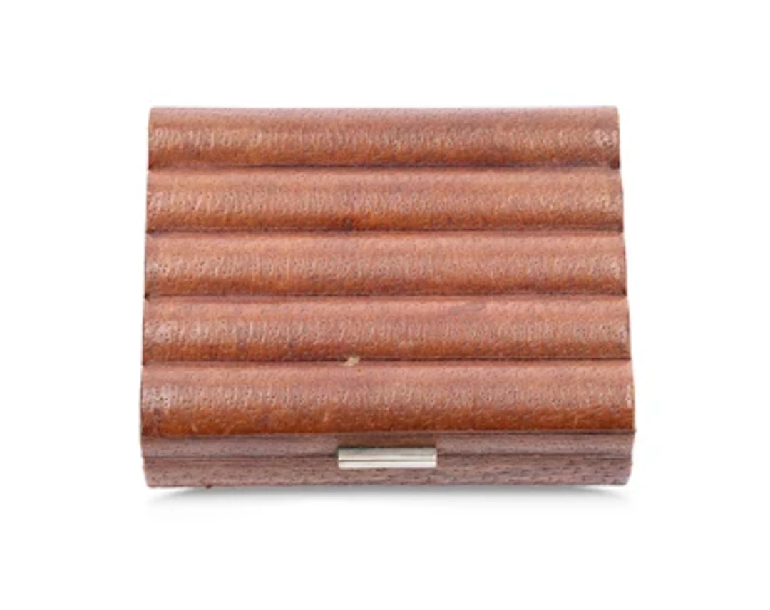 A lidded box or leather snuffbox, designed in around 1920