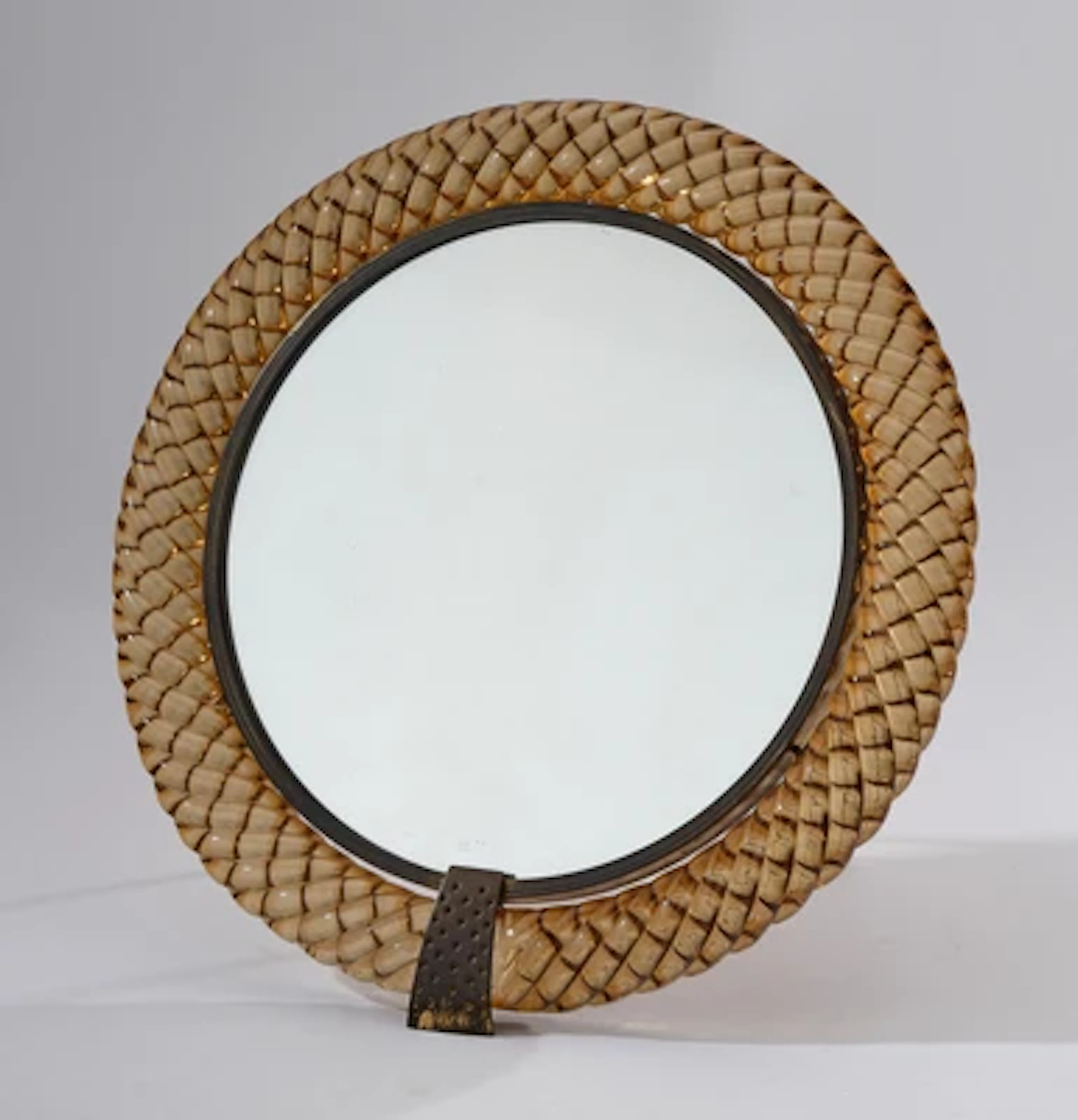 A round table mirror, designed in around 1940, manufactured by Venini & C.