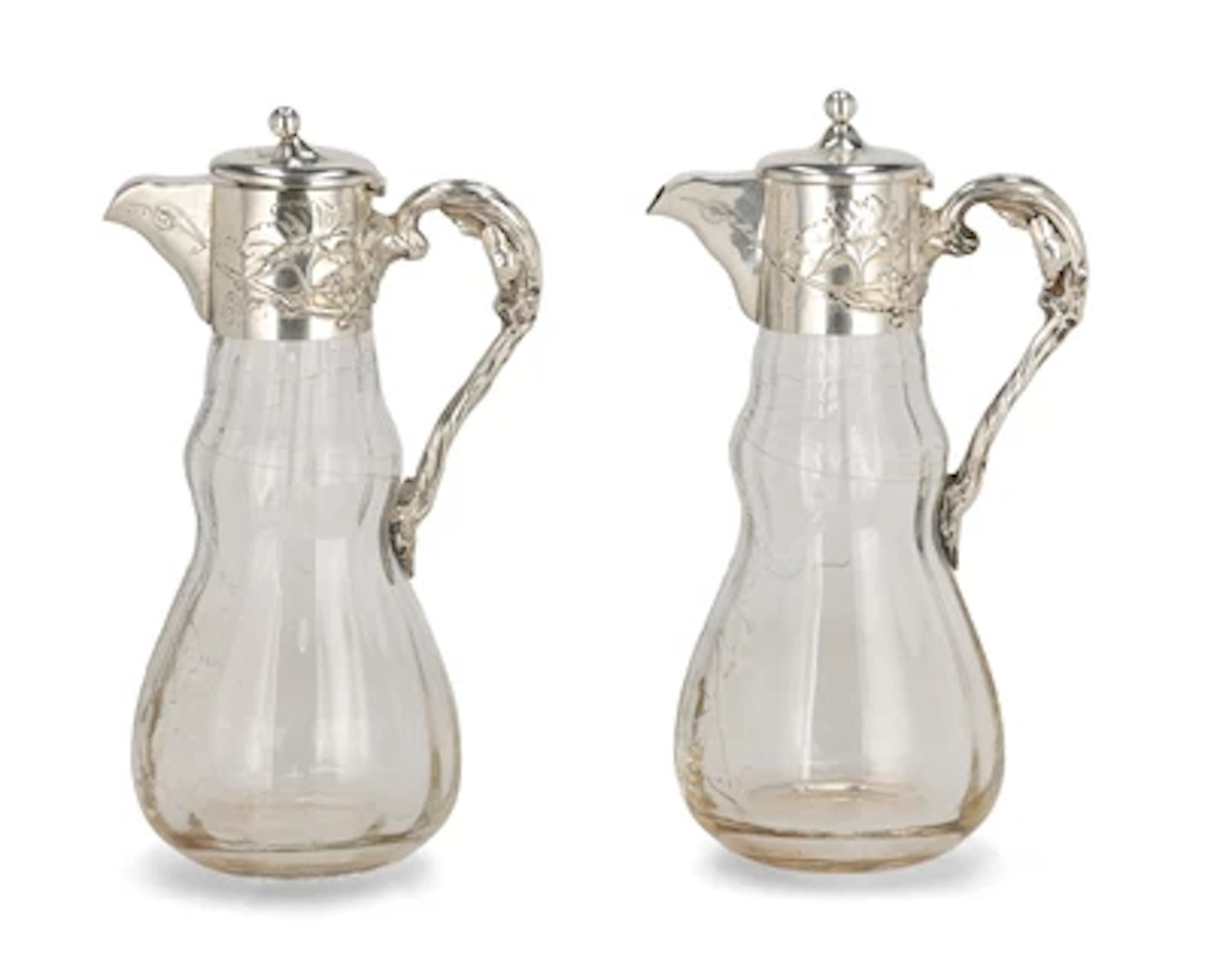 Two handled carafes with silver mounts, decoration with vine tendrils