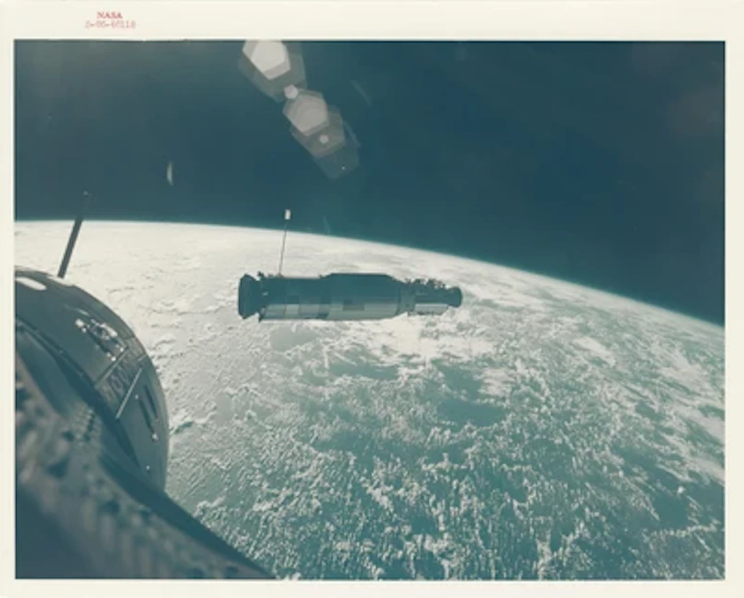 GEMINI X - LIFE Cover: Agena illuminated by orbital sunrise