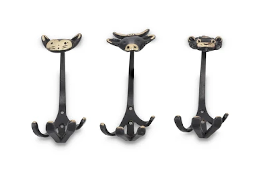 Three coat hooks with animal motifs: monkey, cow and cat, in the manner