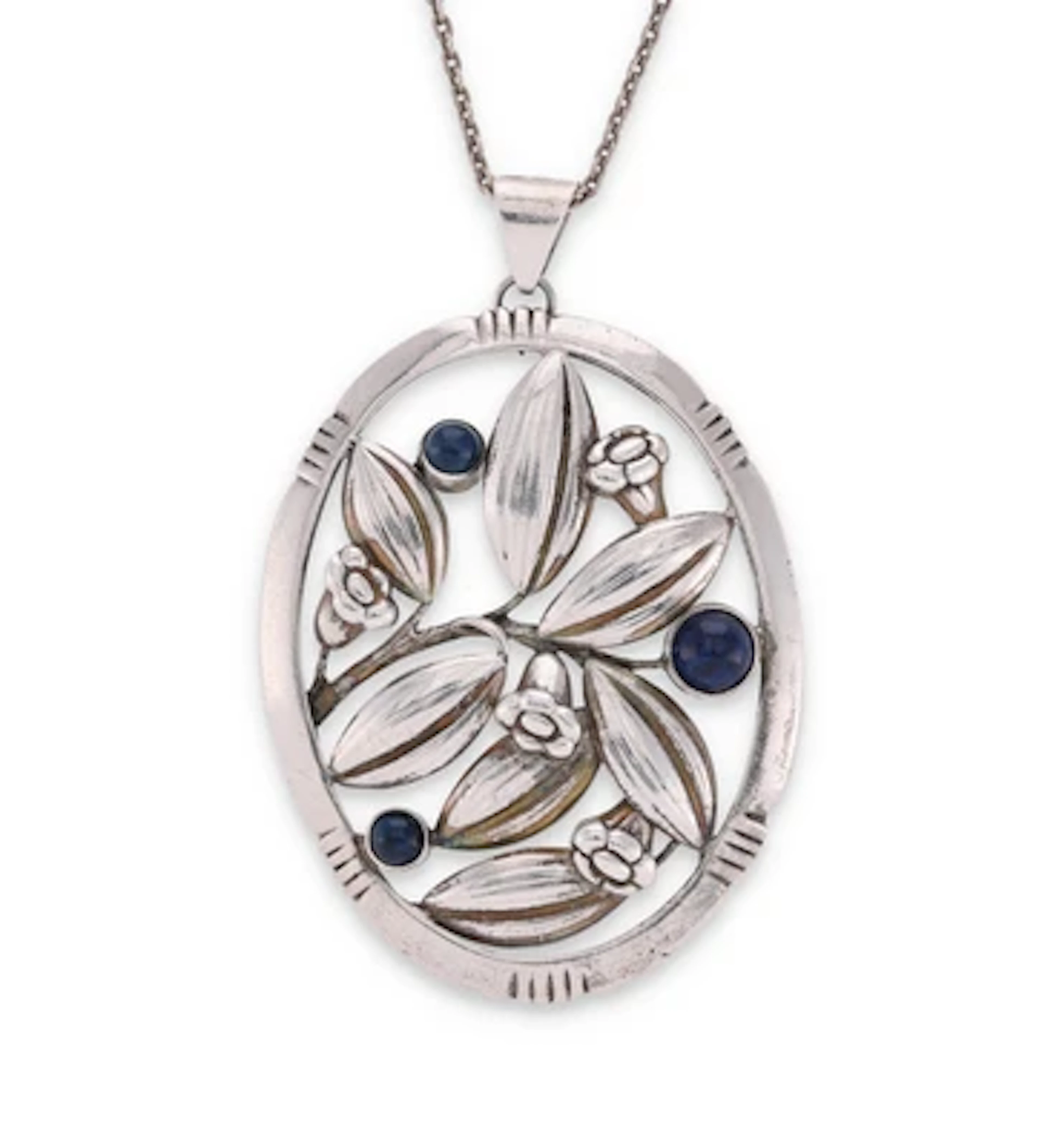 A silver necklace with floral pendant set with sodalite, designed