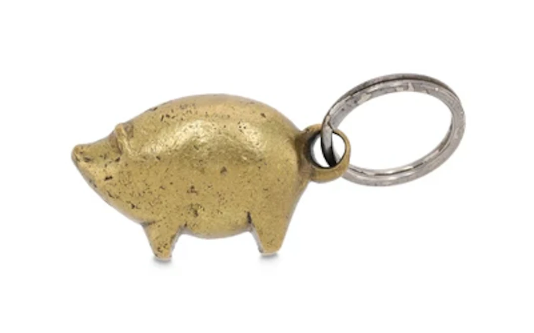 A 'Pig' key ring, model number 4500, in original wooden box, Carl