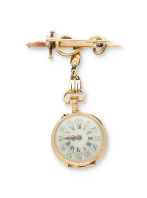 Rose-cut diamonds on the dial of a pendant watch with a brooch clasp