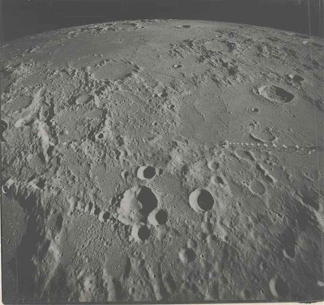 APOLLO 16 - The Moon Unfolding to the Horizon: View Toward Hipparchus Crater