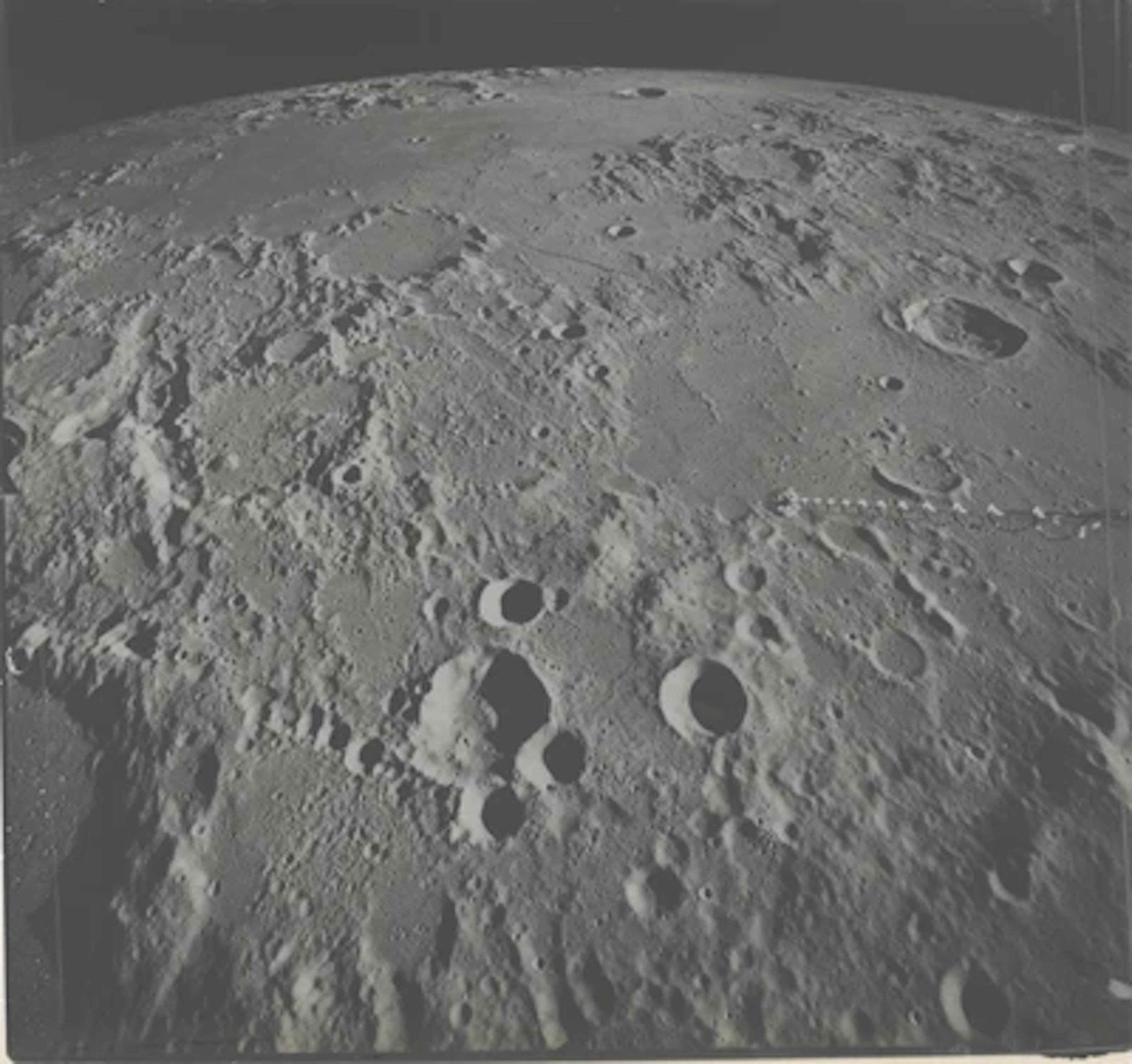 APOLLO 16 - The Moon Unfolding to the Horizon: View Toward Hipparchus Crater
