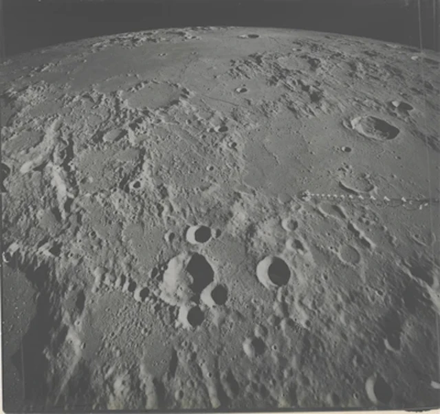 APOLLO 16 - The Moon Unfolding to the Horizon: View Toward Hipparchus Crater