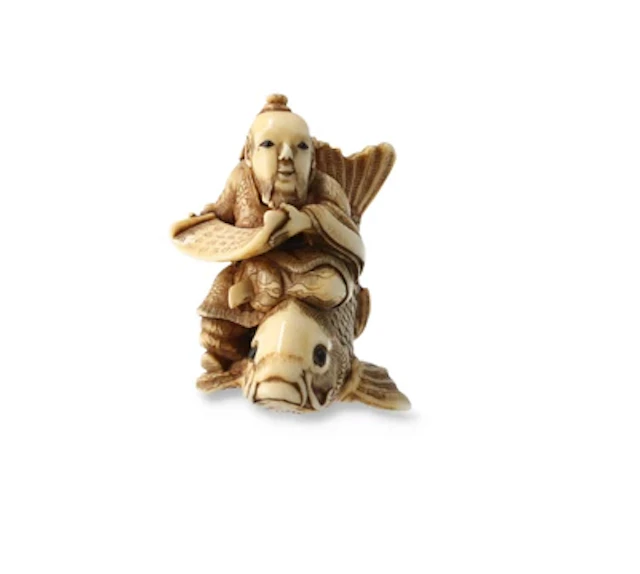 Netsuke des Sennin Kinko auf Koi Karpfen, Japan, 19. Jh., signiert Ikko