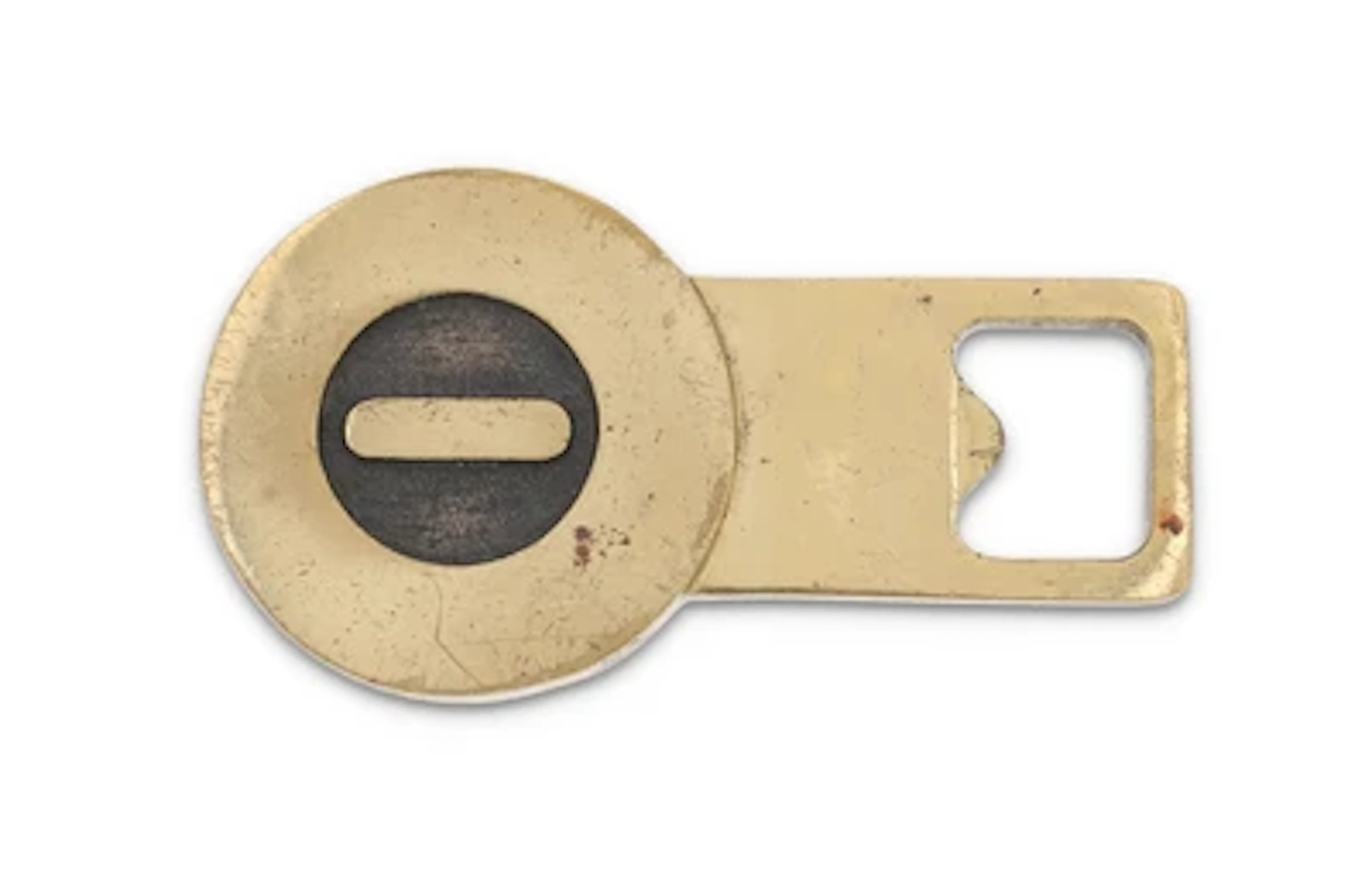 A bottle opener with the letter 'O', model number 4919, Carl Auböck