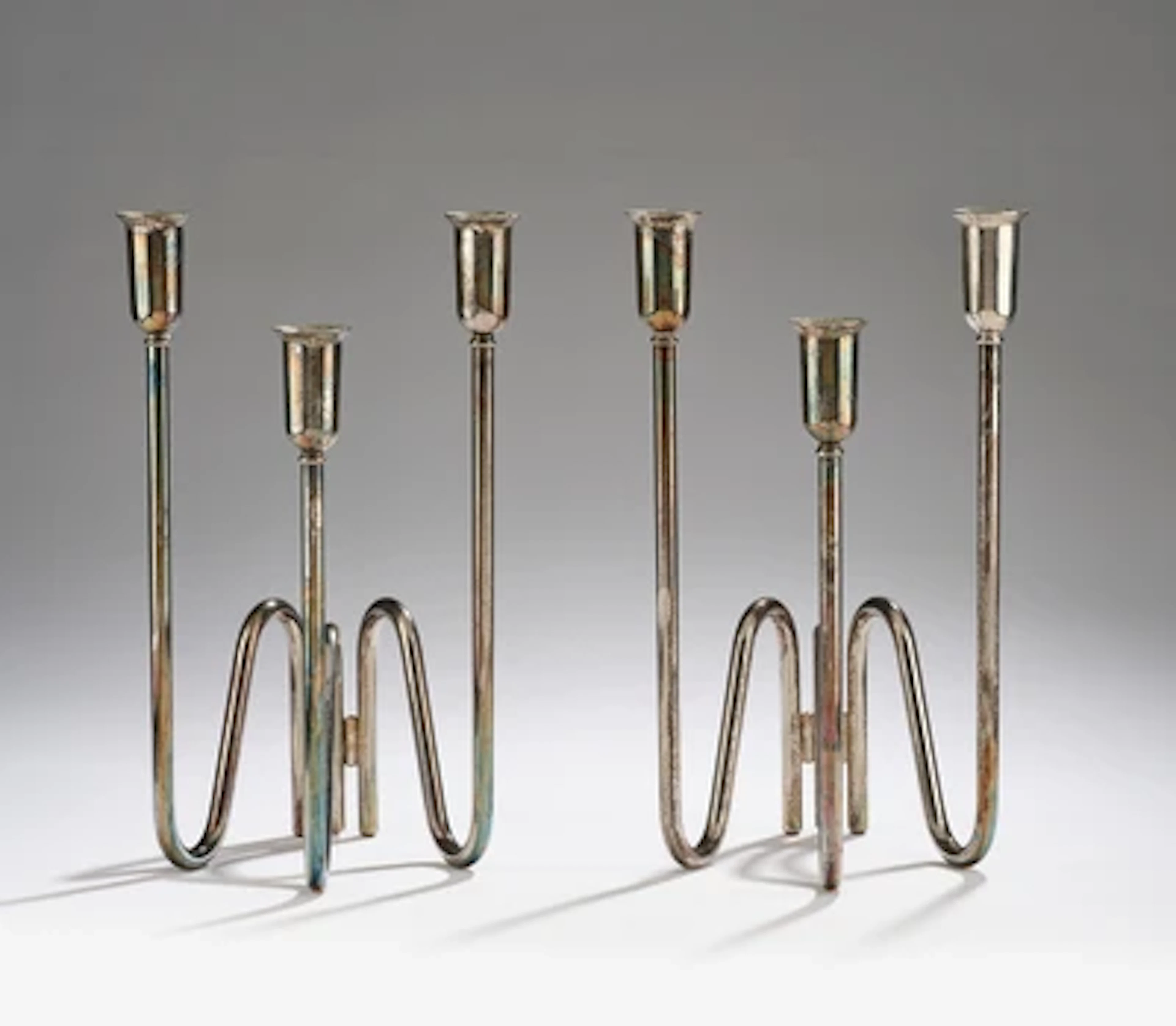 A pair of candelabra, in the style of Lino Sabattini, Italy, 1970s