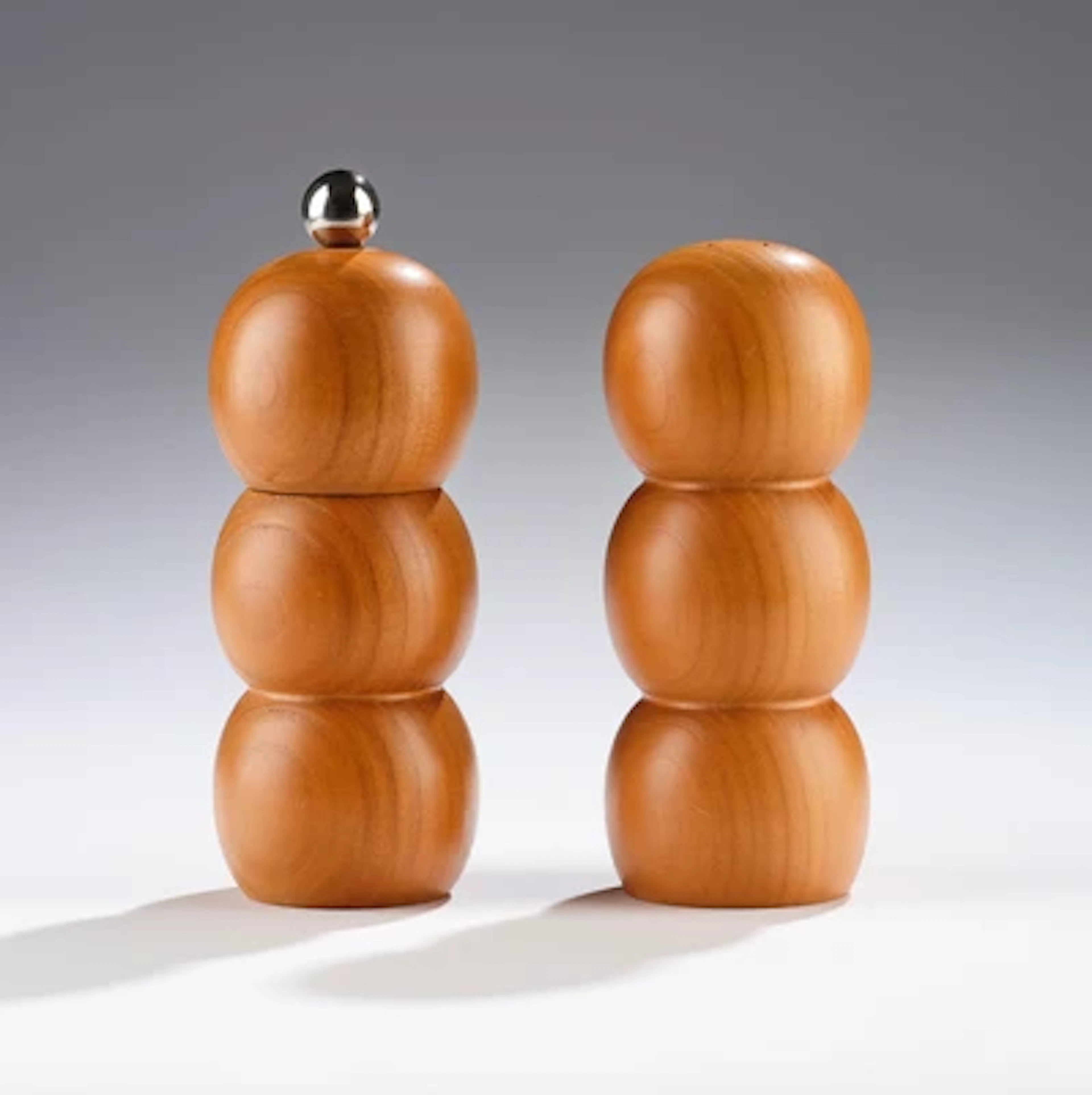 A salt cellar and a pepper mill, model number 6031, Carl Auböck III