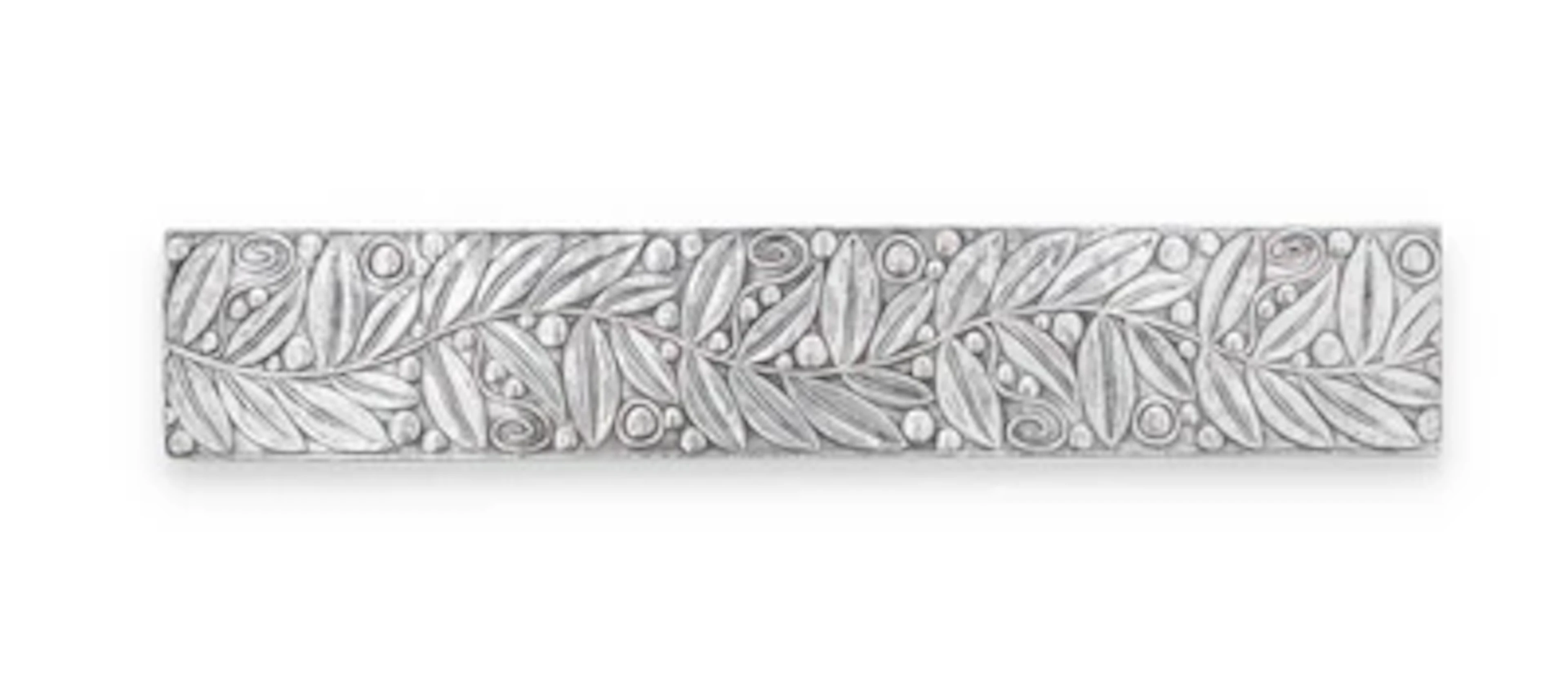 A silvered bookmark with vegetal decoration, in the style of the Wiener