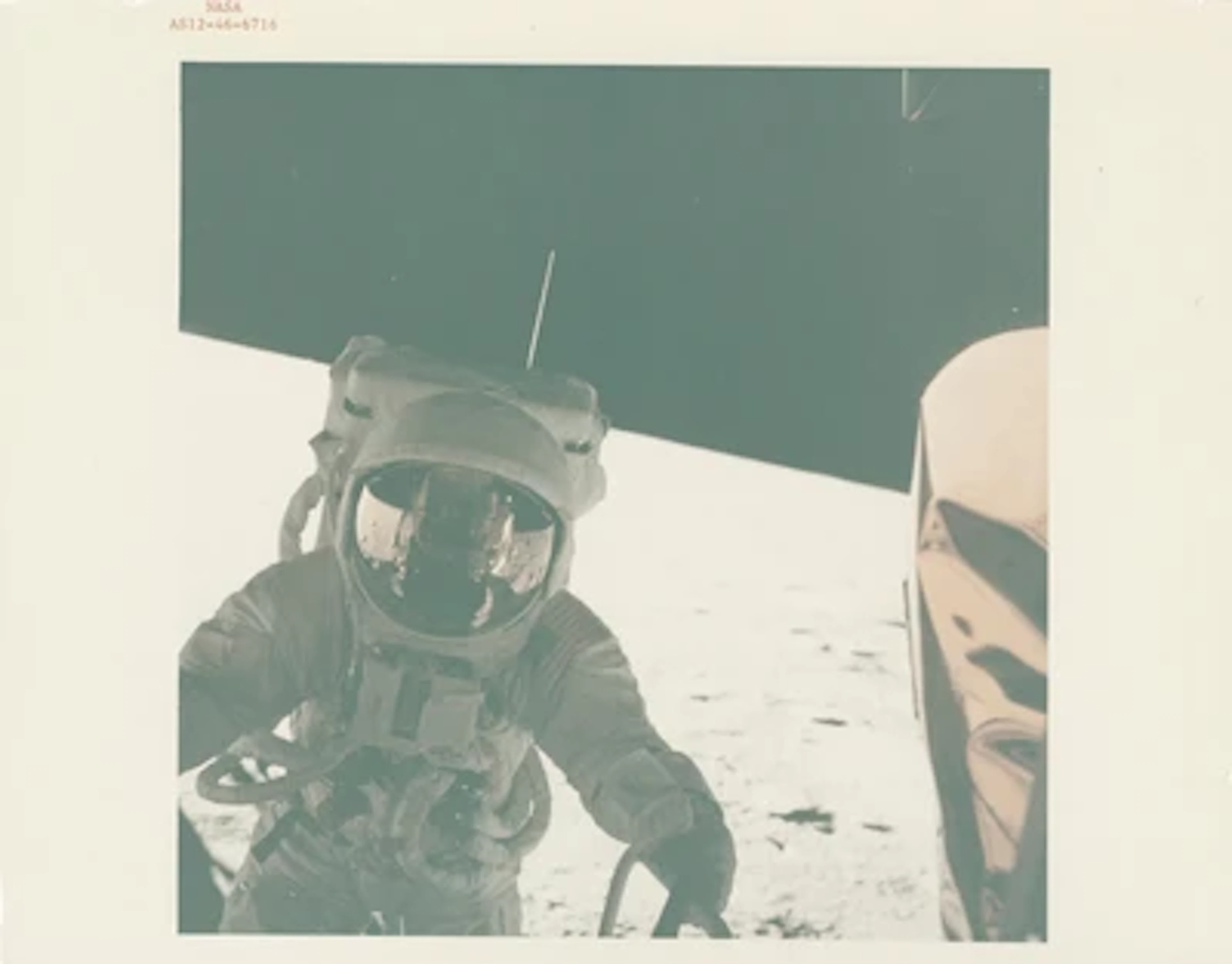 APOLLO 12 - Pete Conrad Exiting LM Intrepid to Walk on the Moon