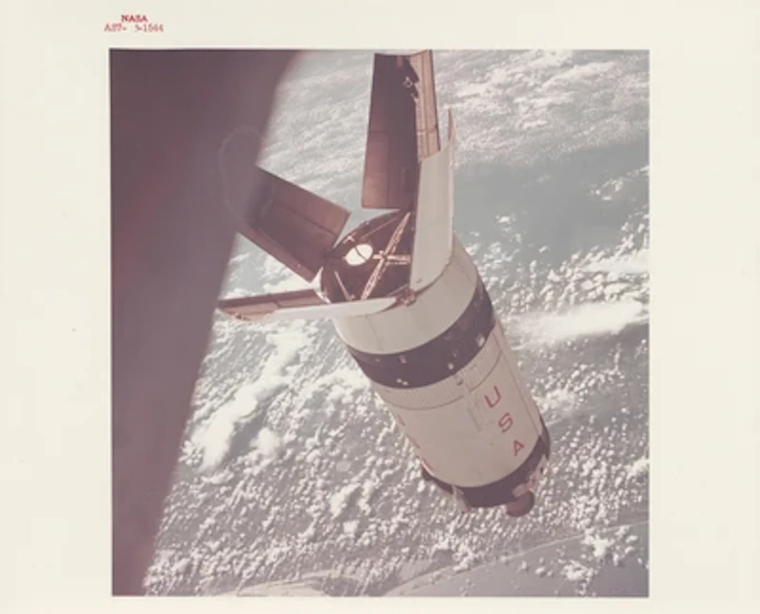APOLLO 7 - The Opened Petals of the Saturn S-IVB above Cape Kennedy