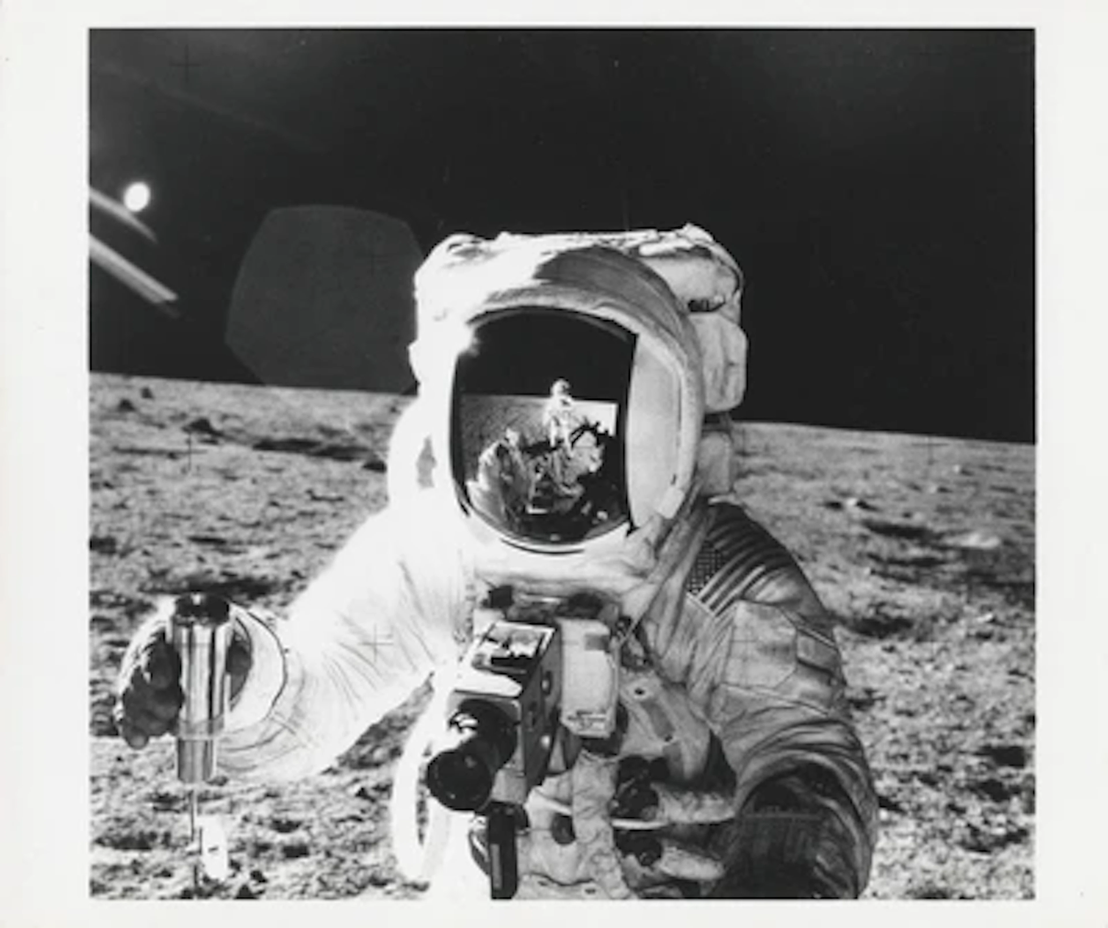 APOLLO 12 - Alan Bean with the Photographer Reflected in His Visor