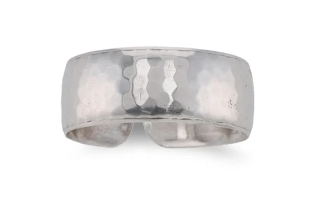 A silver bangle with hammered decoration, Alexander Sturm, Vienna