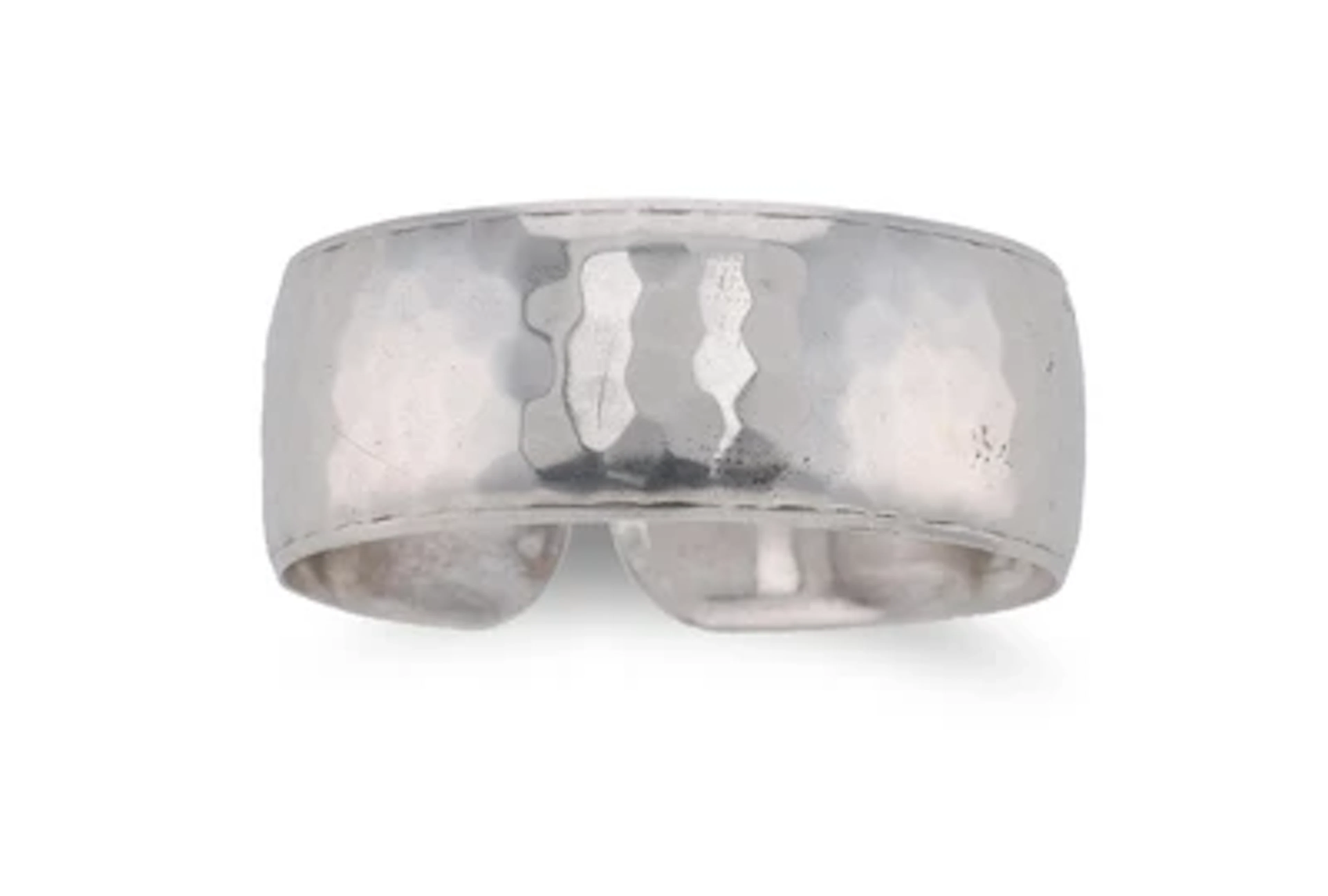 A silver bangle with hammered decoration, Alexander Sturm, Vienna