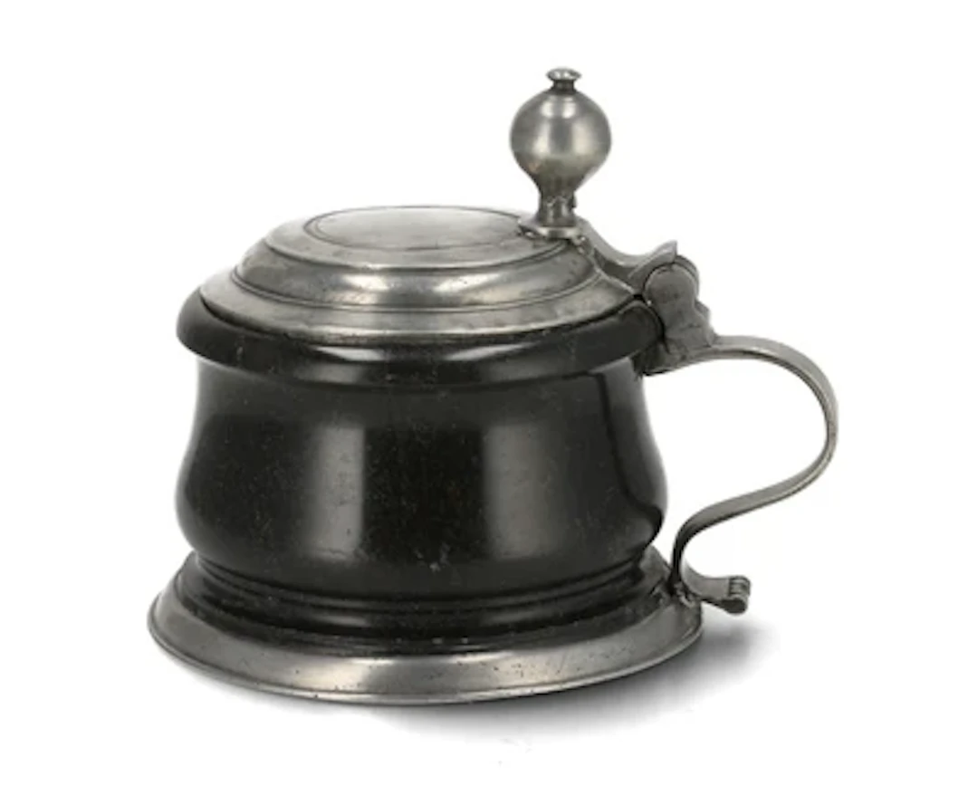 A Saxon Serpentine Tankard with Cover