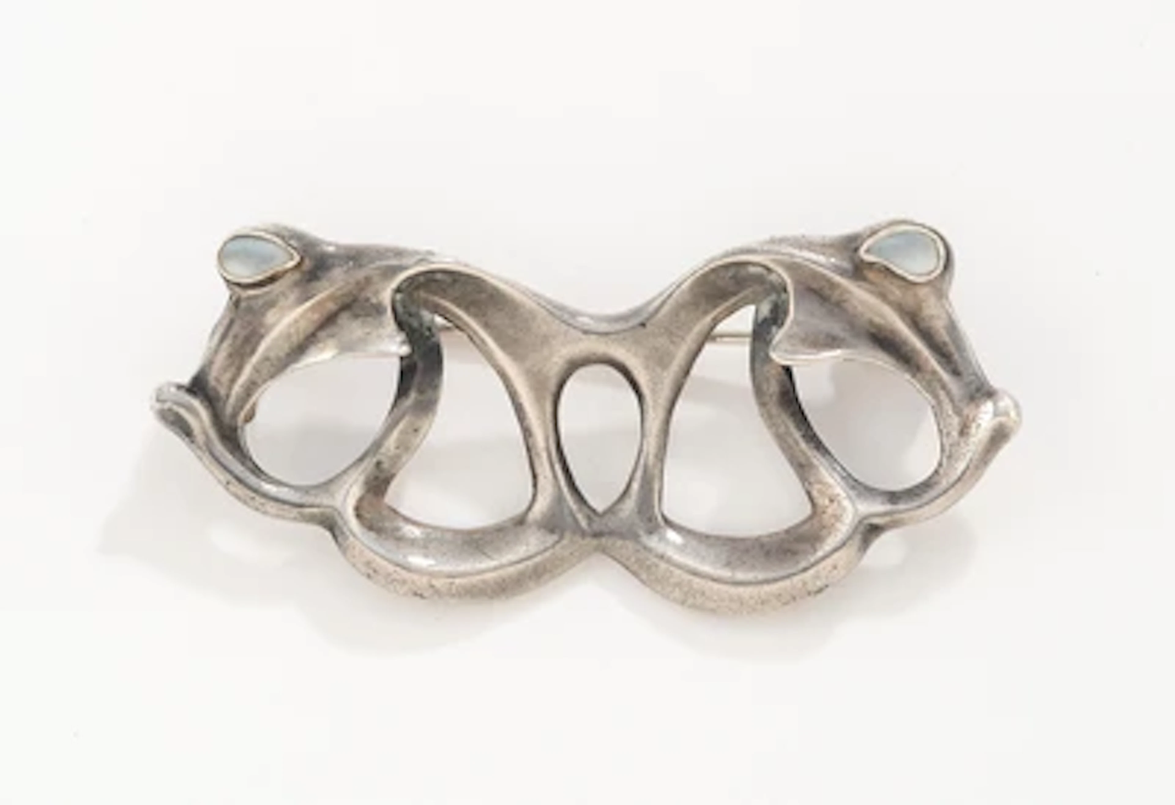 Paul Bürck (Strasbourg 1878 - 1947 Munich), a silver brooch, Theodor