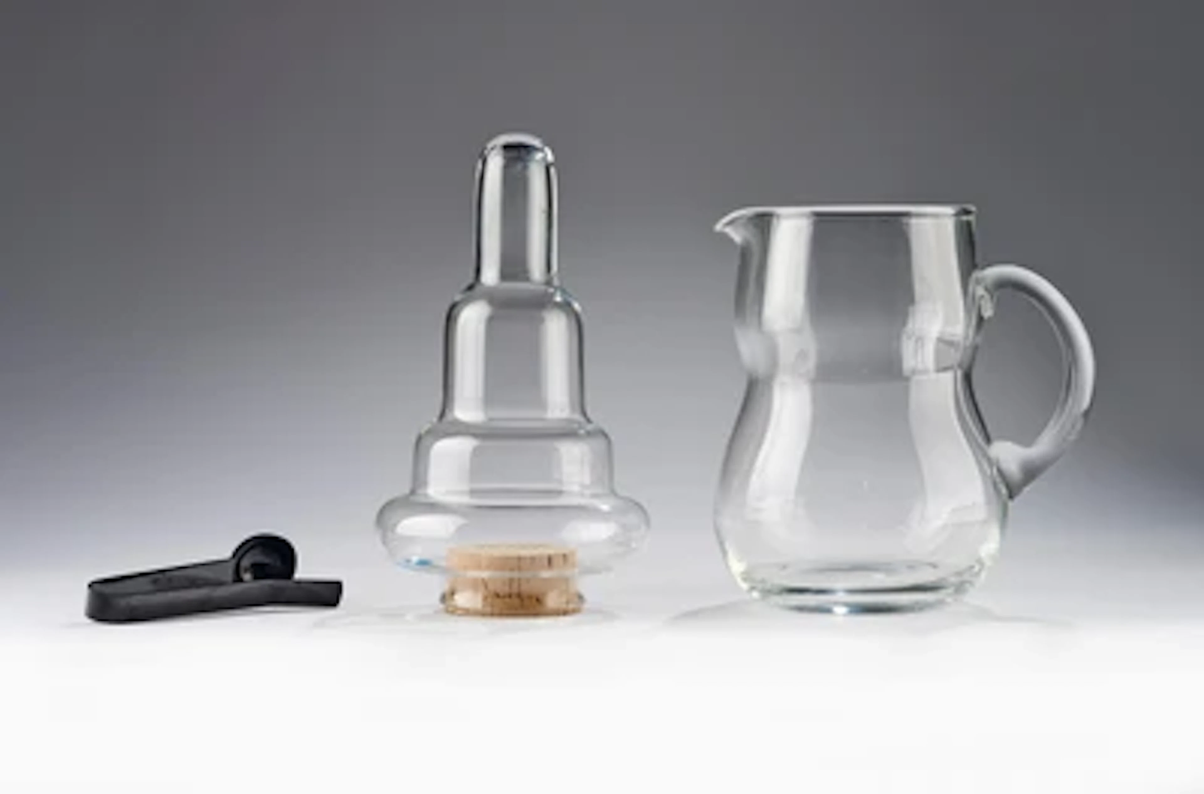 A jug from the ‘Glockenserie’ and ice tongs, designed by Carl Auböck