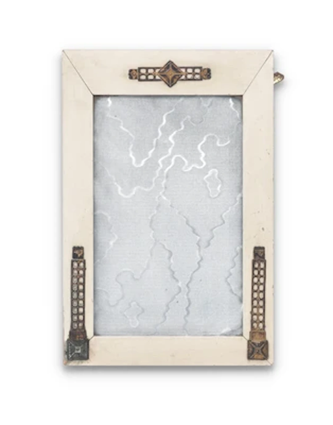 A standing photo frame with decoration in the style of Viennese Modernism