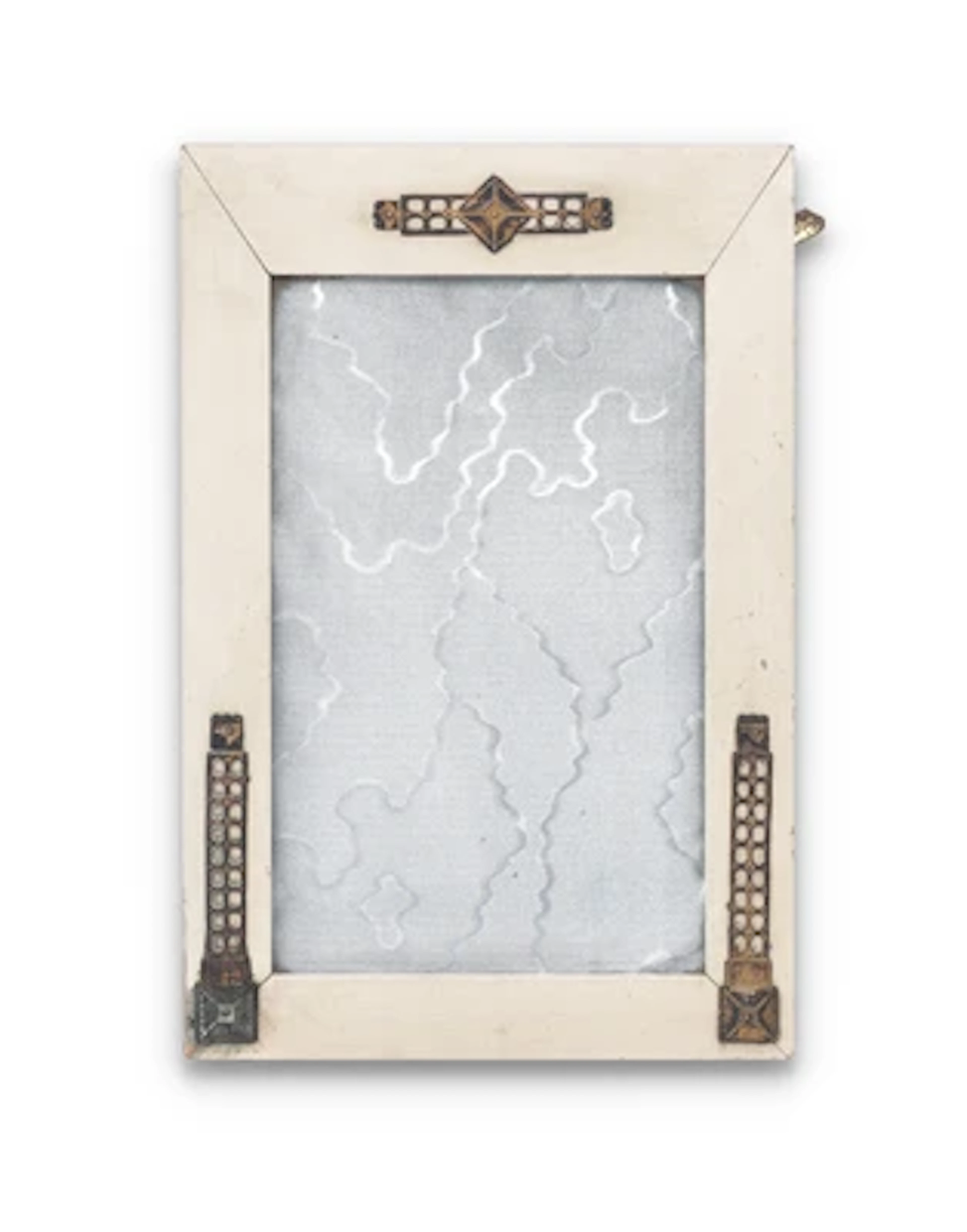 A standing photo frame with decoration in the style of Viennese Modernism
