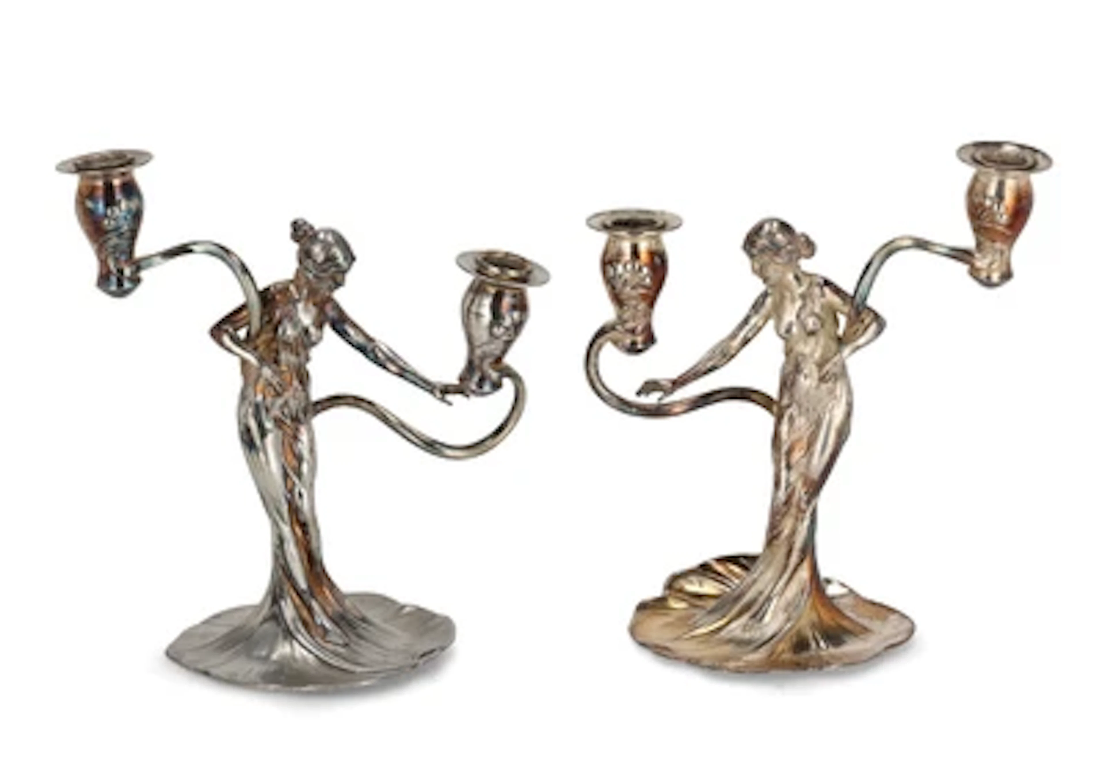 Two two-light candlesticks with female figures, c. 1900/10