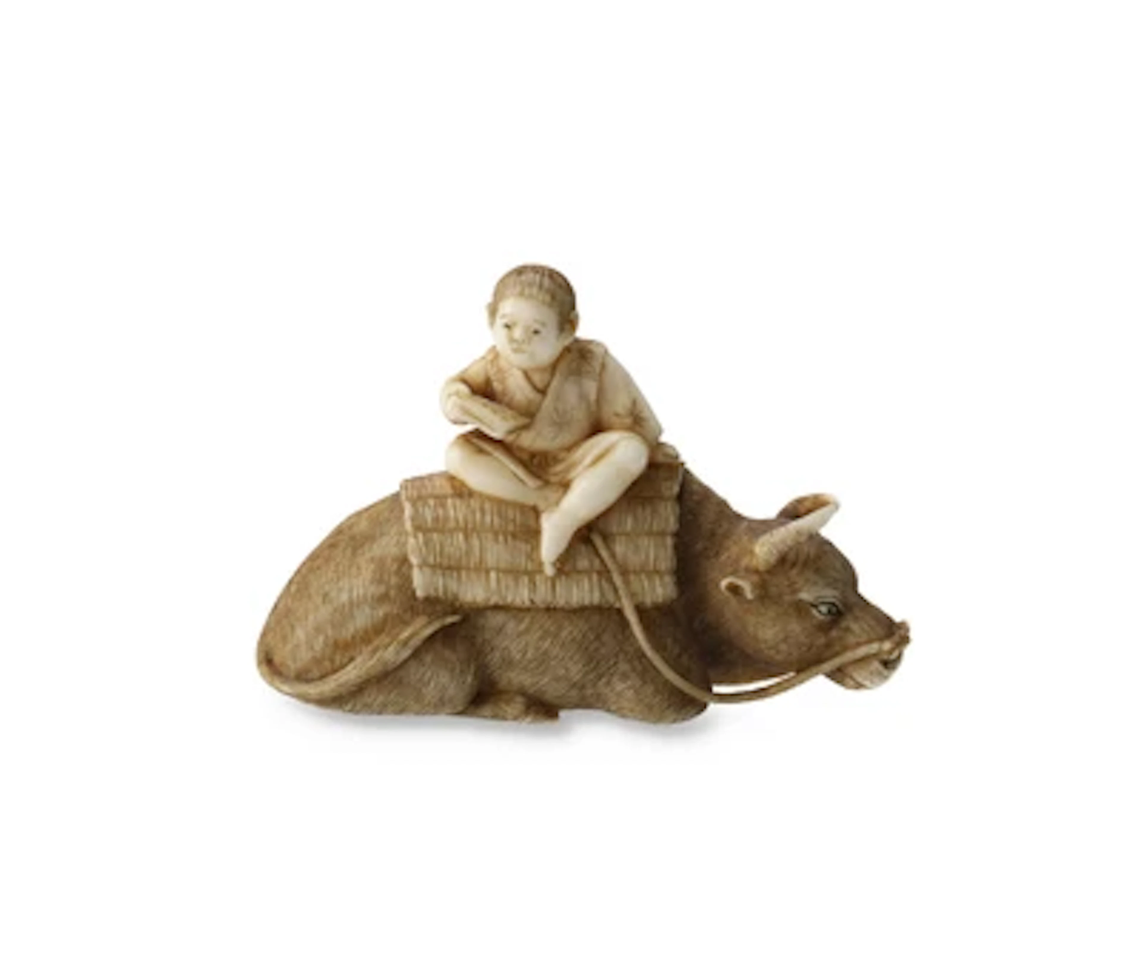 Netsuke eines Knaben auf liegendem Rind, Japan, Meiji Periode (1868-1912)
