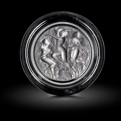 A 'Cote d'or' plate with three female nudes, designed by René Lalique