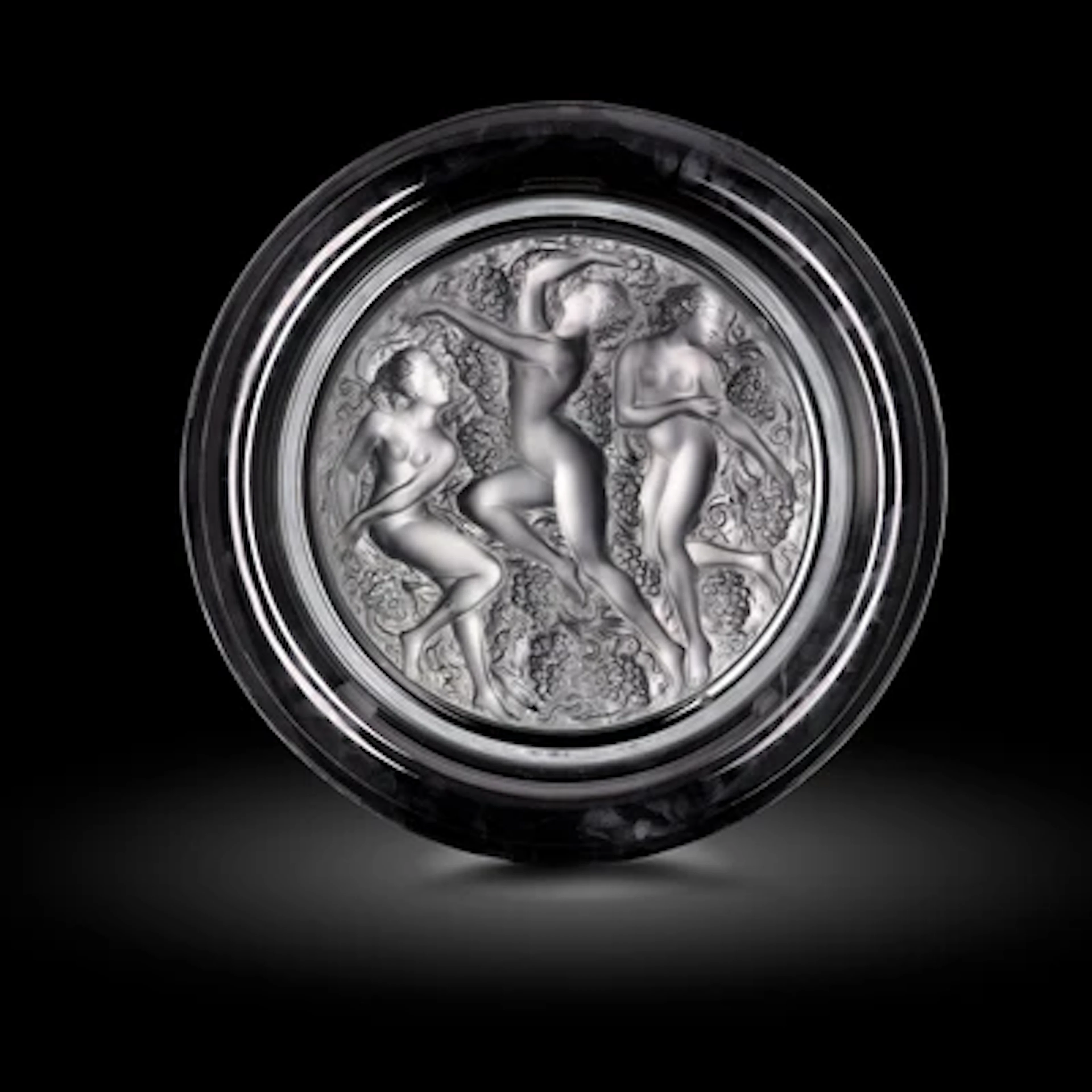 A 'Cote d'or' plate with three female nudes, designed by René Lalique