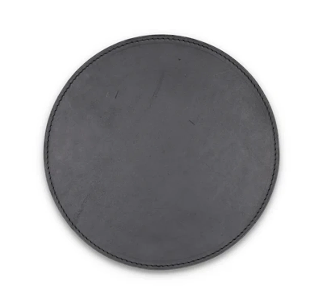 A leather mat, Carl Auböck, Vienna, c. 1980