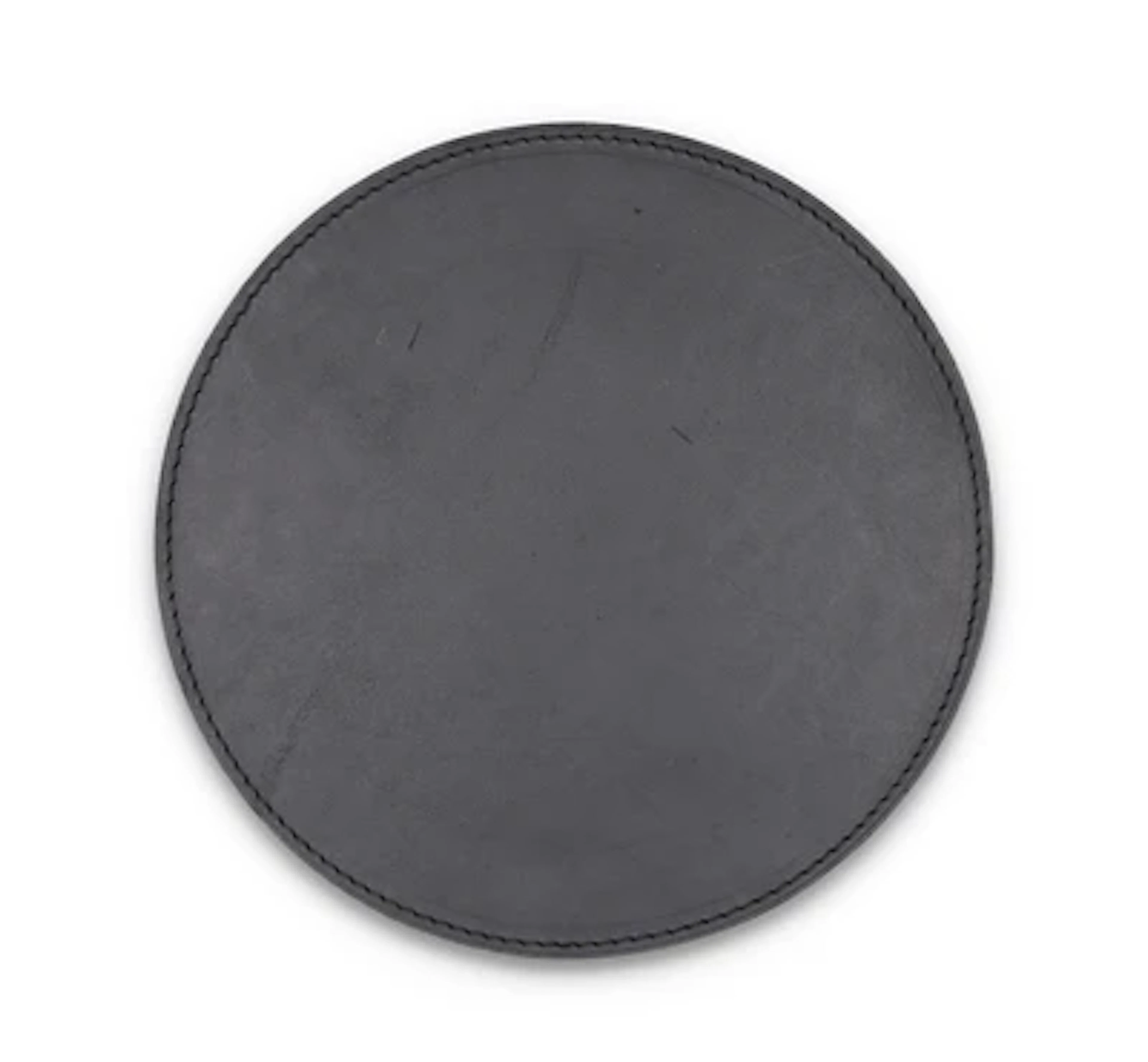 A leather mat, Carl Auböck, Vienna, c. 1980