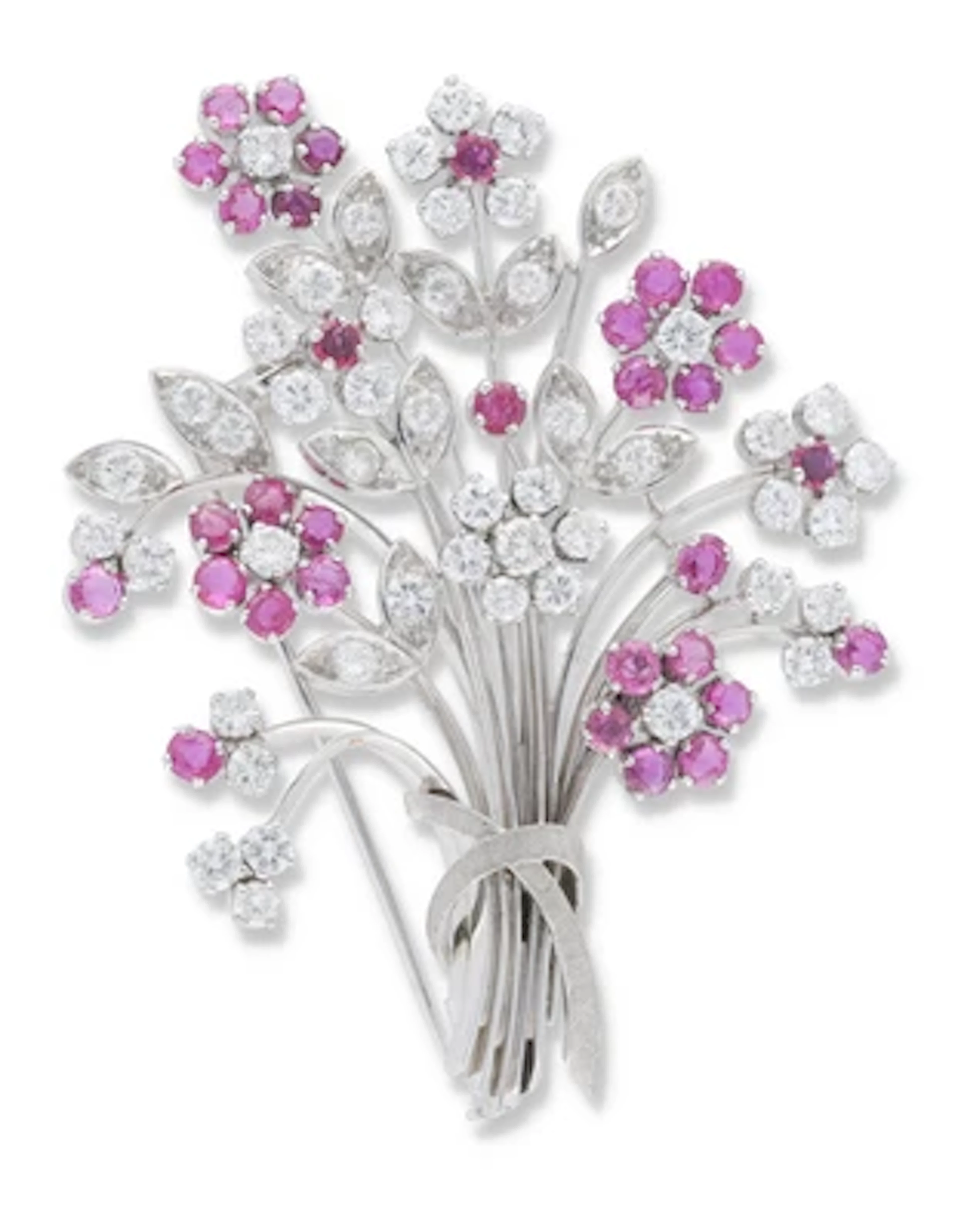 Brillantbrosche mit unbehandelten Rubinen zus. ca. 5,80 ct
