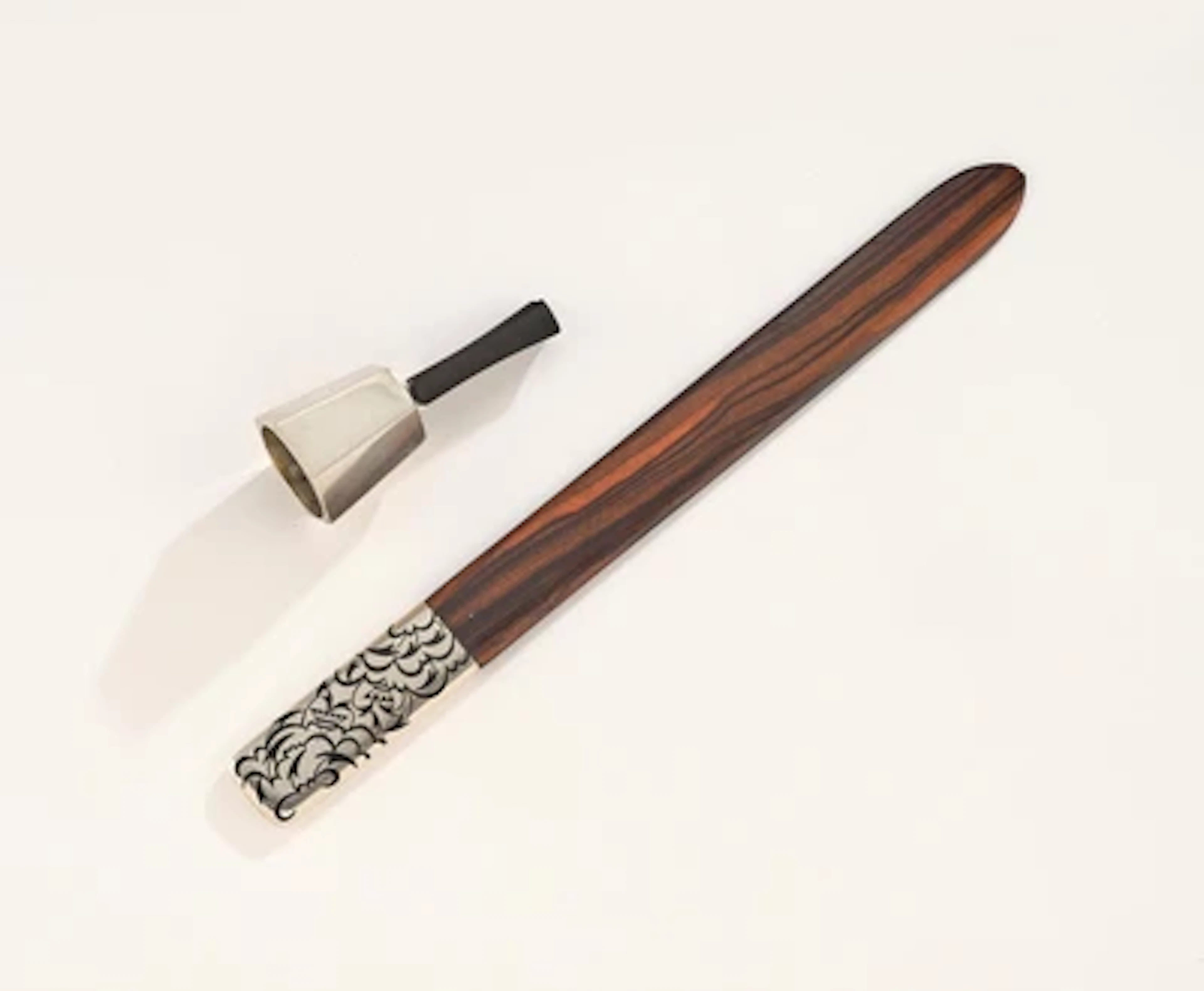 Two silver objects: a letter opener in the style of Dagobert Peche
