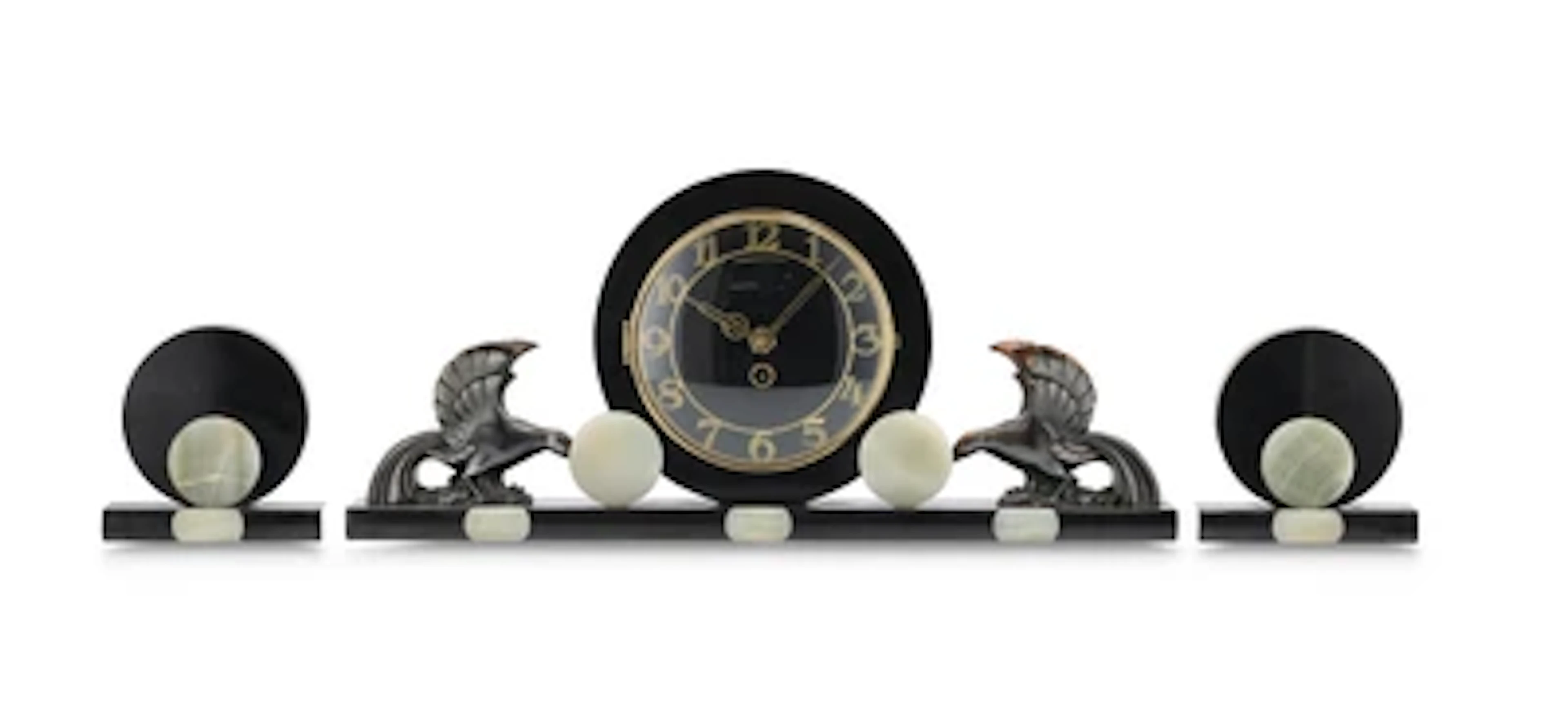 An Art Deco onyx mantel clock with birds and two bookends, c. 1920/35