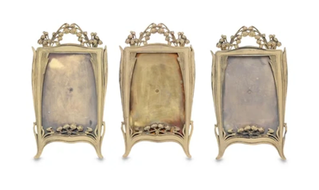 Three standing photo frames with lily-of-the-valley decoration, c. 1900/15