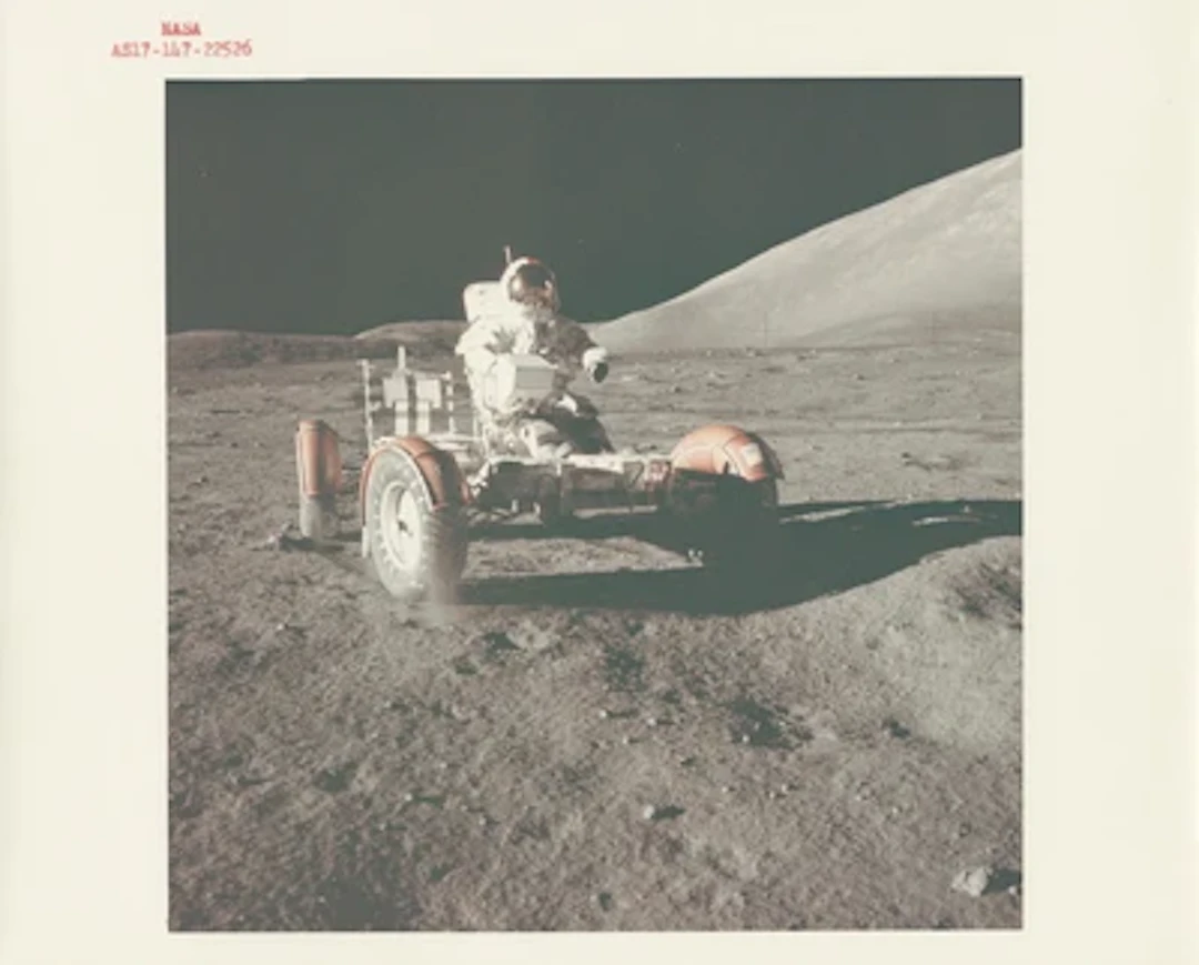 APOLLO 17 - Eugene Cernan Driving the Lunar Rover Across the Moon